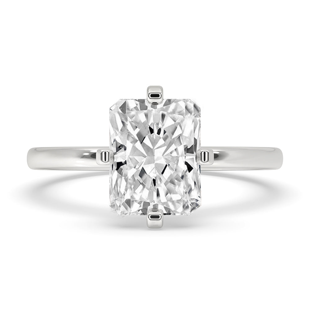 Radiant cut diamond ring with timeless shine.