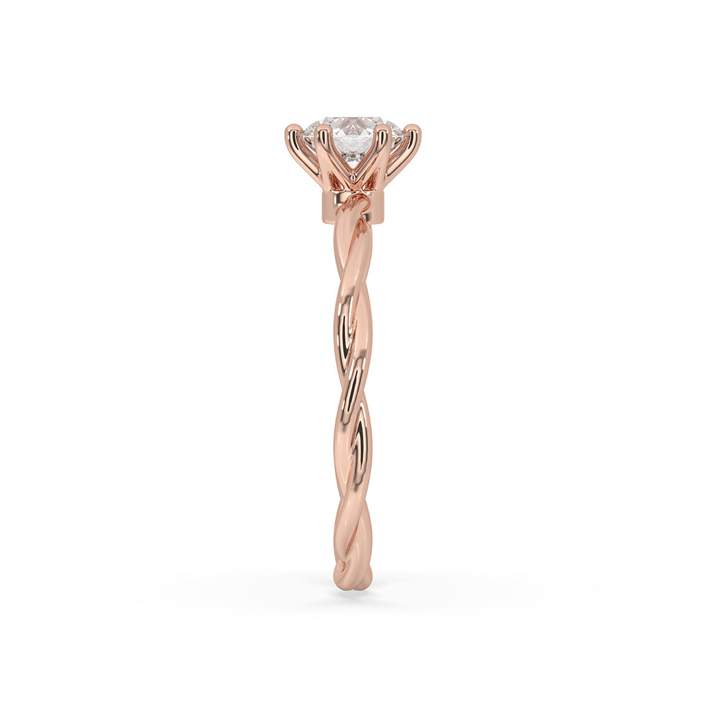 Rose gold diamond ring with a prong setting for a secure fit.
