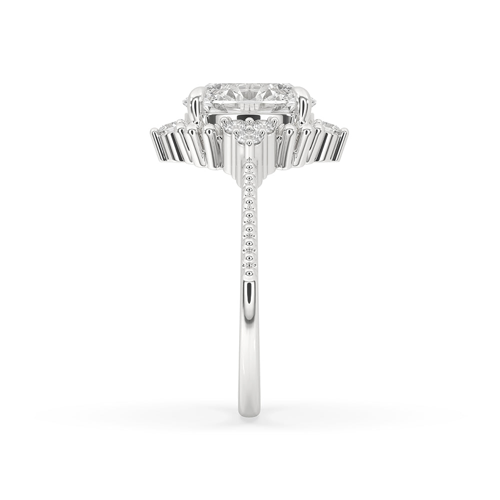 White gold engagement ring featuring a unique fishtail prong design.
