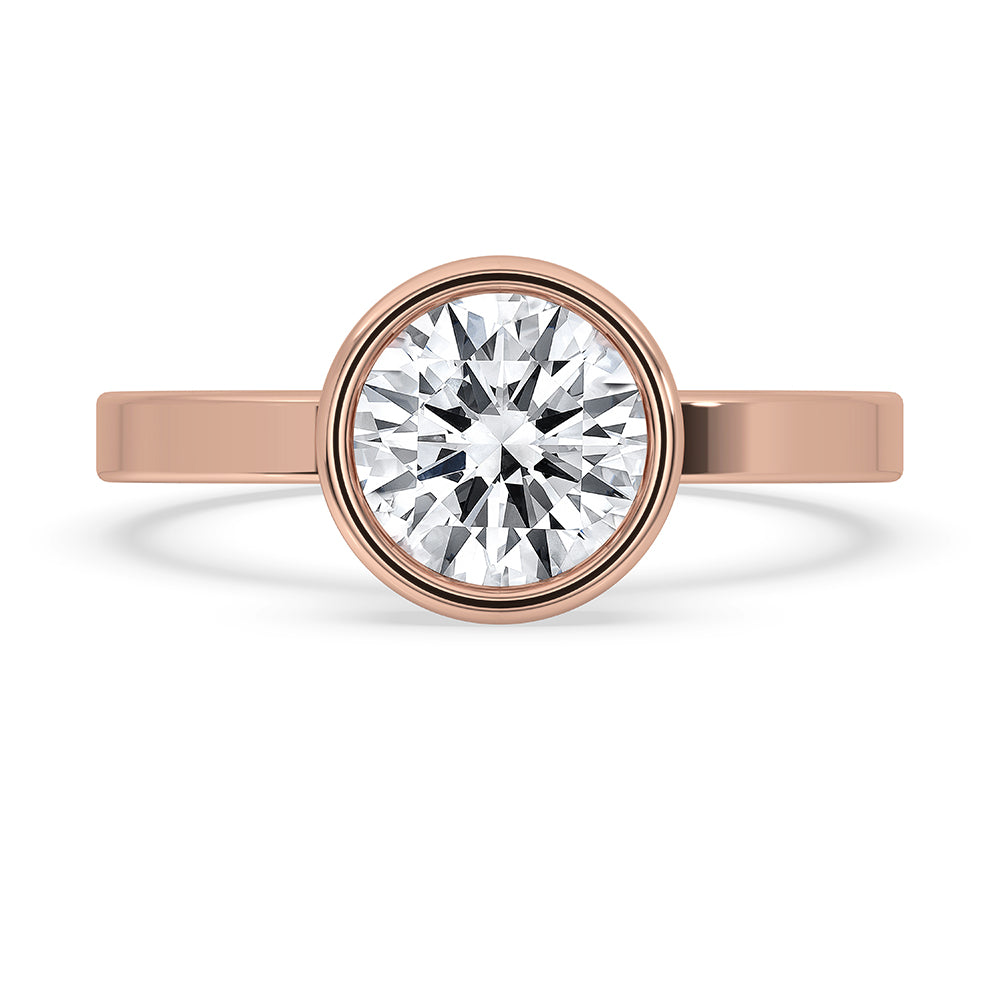 Round cut diamond placed at the center.
