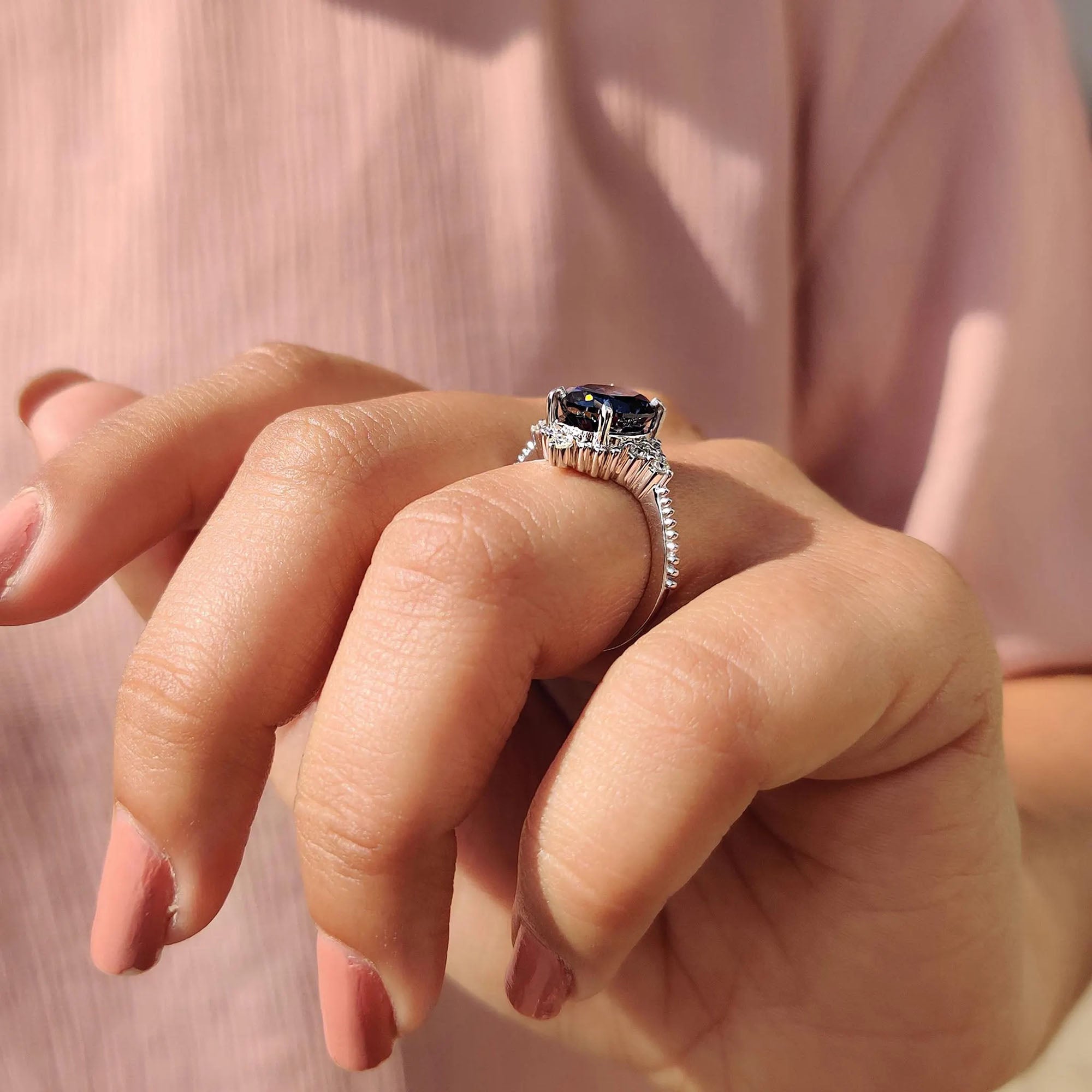 Oval engagement ring features a clean layout with a strong center.
