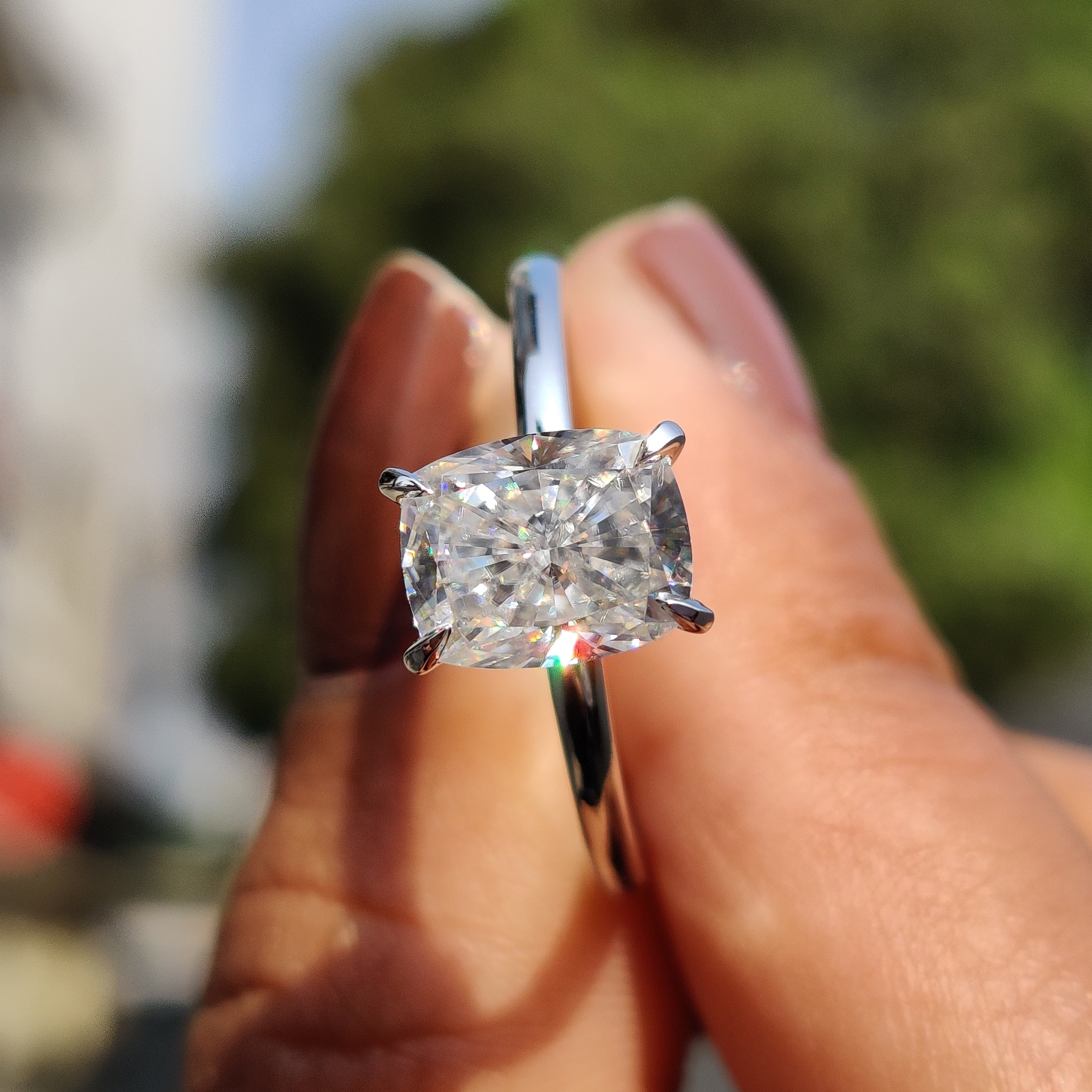 Cushion Cut Engagement Ring With Hidden Halo