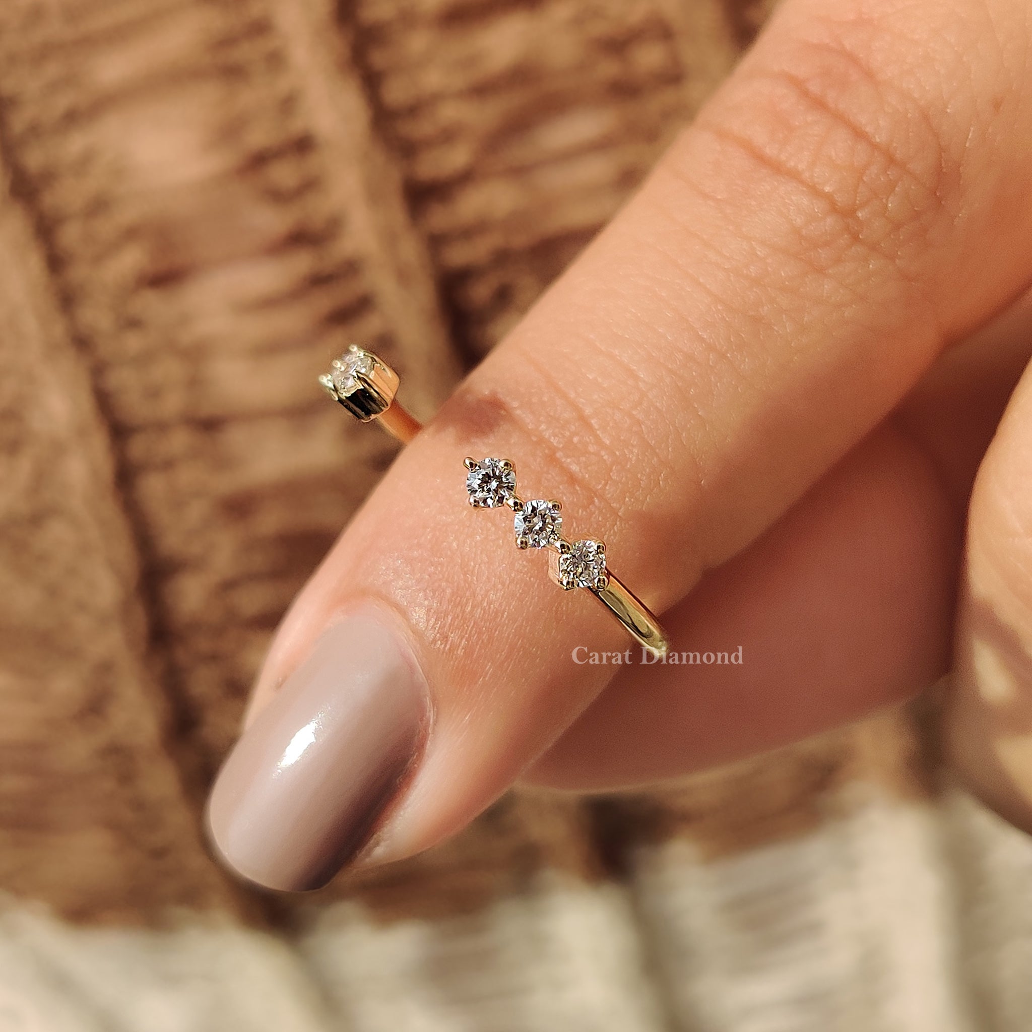 Round diamond wedding band shown in soft lighting.
