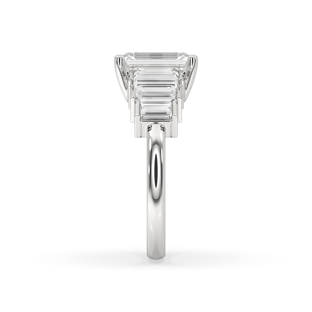 Baguette side stone ring with sparkling diamonds.

