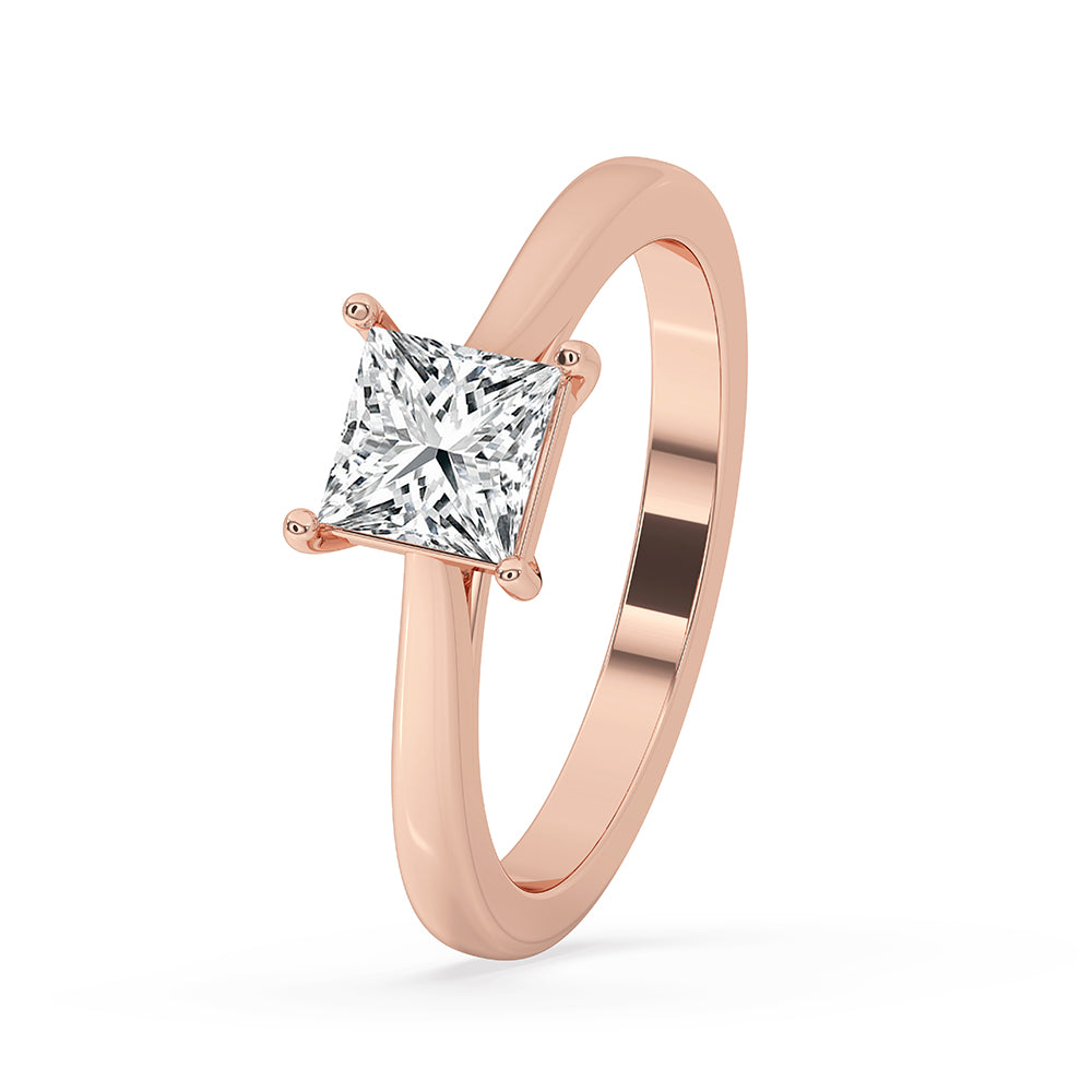 Elegant rose gold ring featuring a Princess Cut Solitaire Diamond, perfect for a custom engagement ring.
