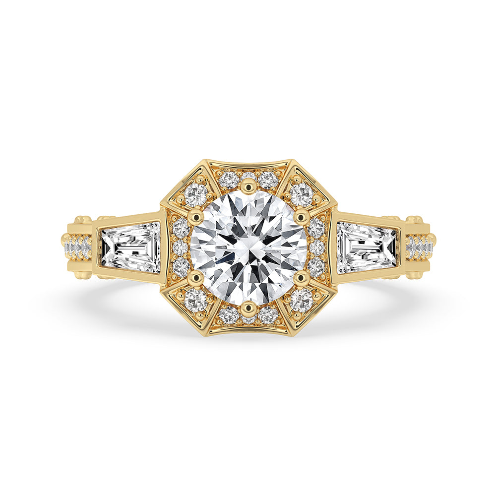 Vintage diamond ring with intricate details and yellow gold setting.

