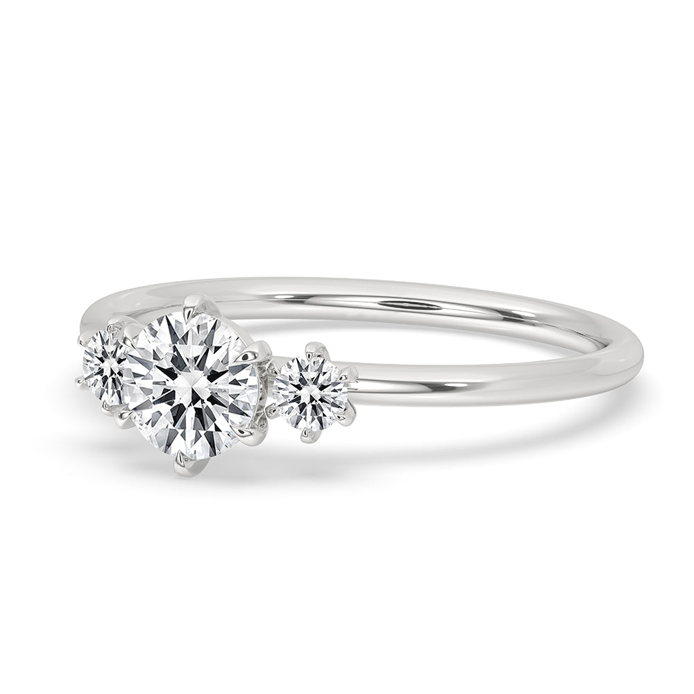 Round cut diamond ring in a prong setting, perfect for an engagement in white gold.
