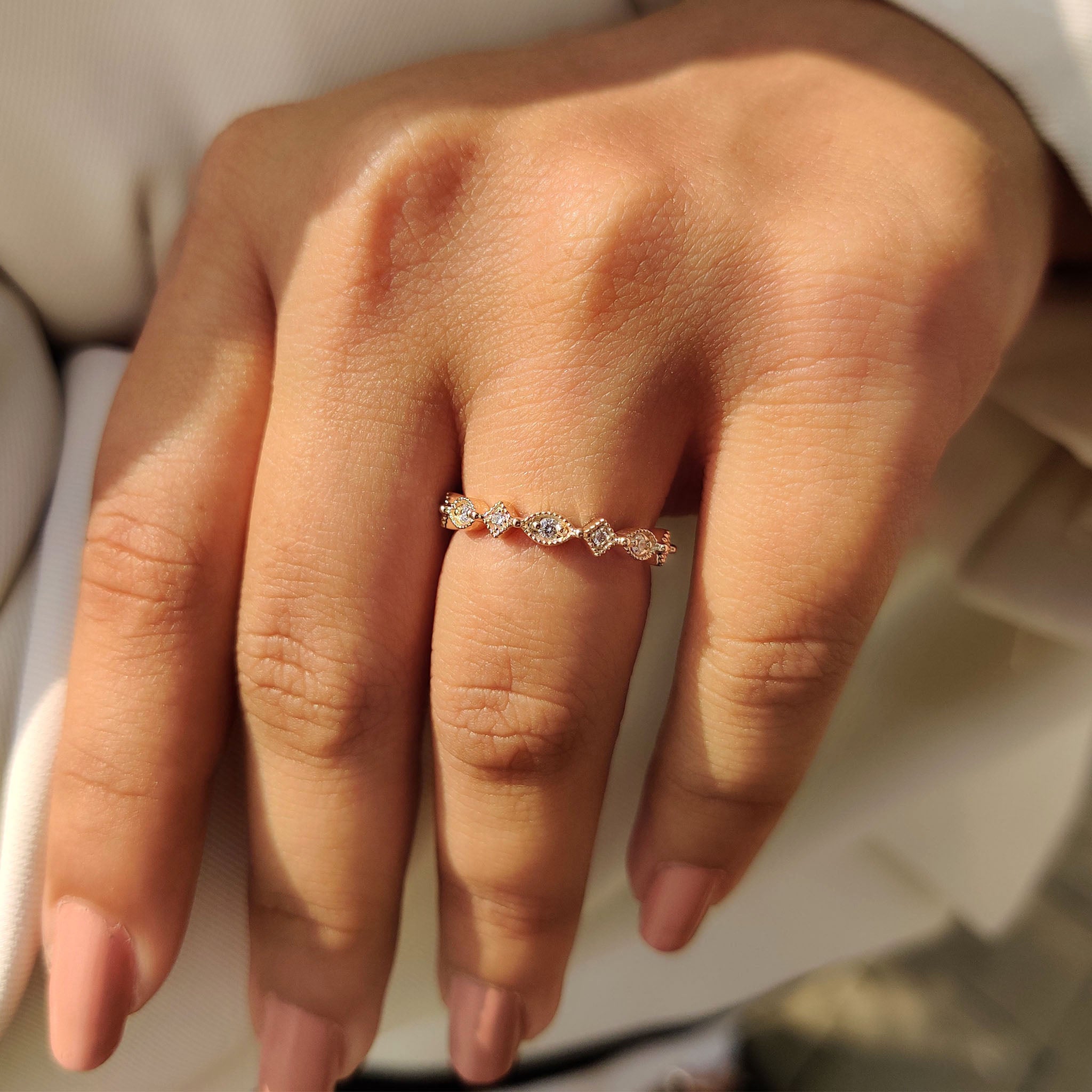 Yellow gold diamond ring with handmade band and custom wedding design.
