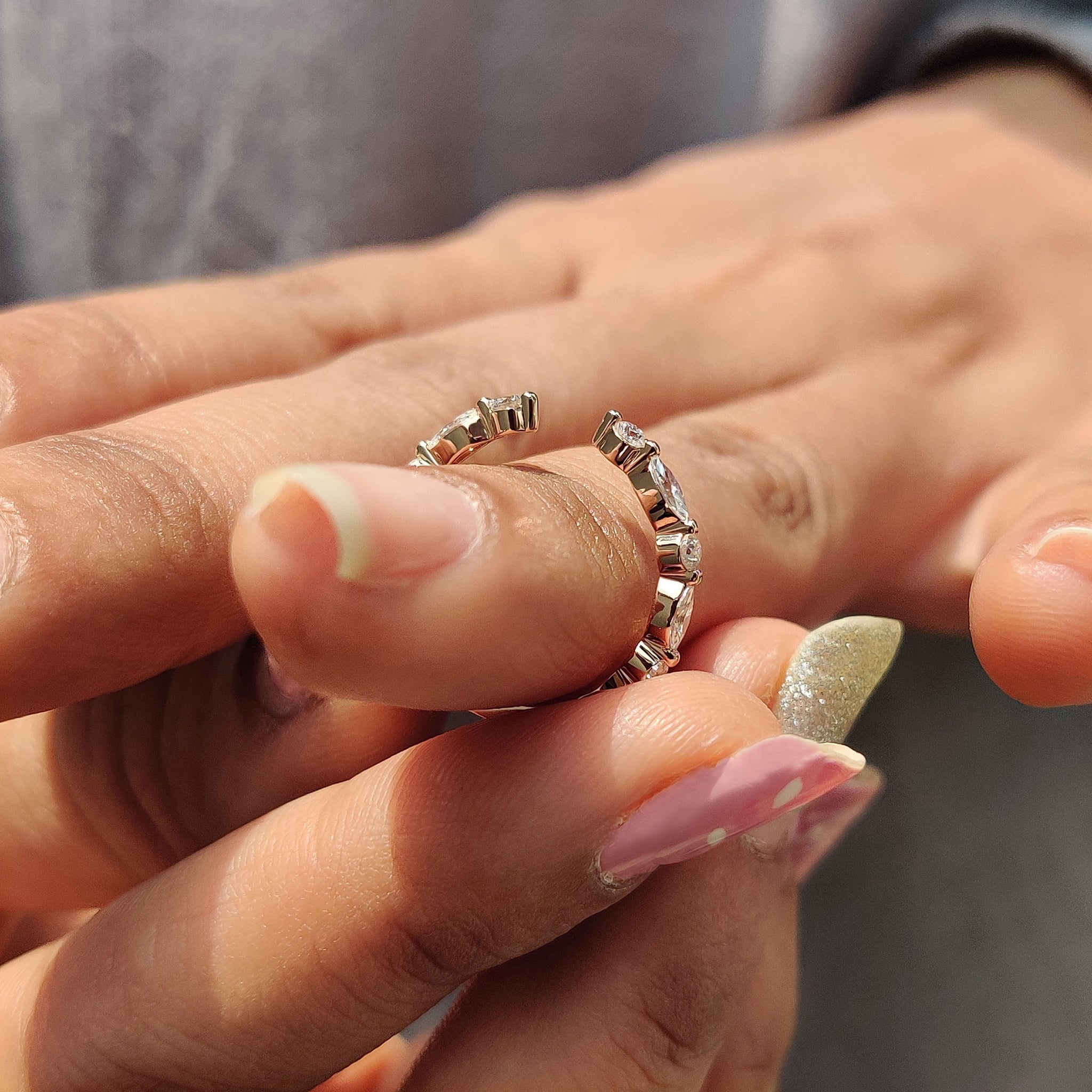 Marquise and round wedding band set in a simple, unique wedding band design.