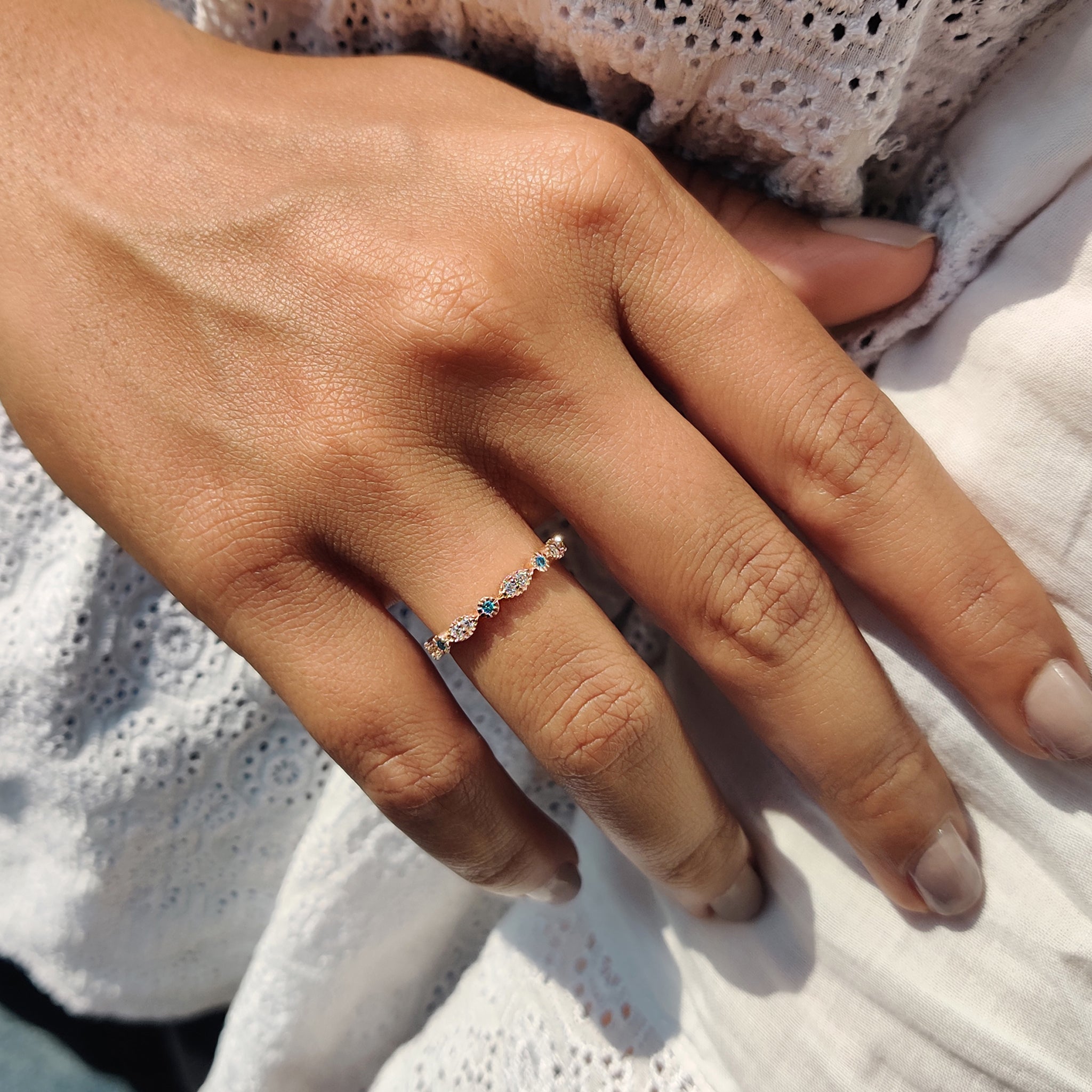 Rose gold wedding band with polished finish.