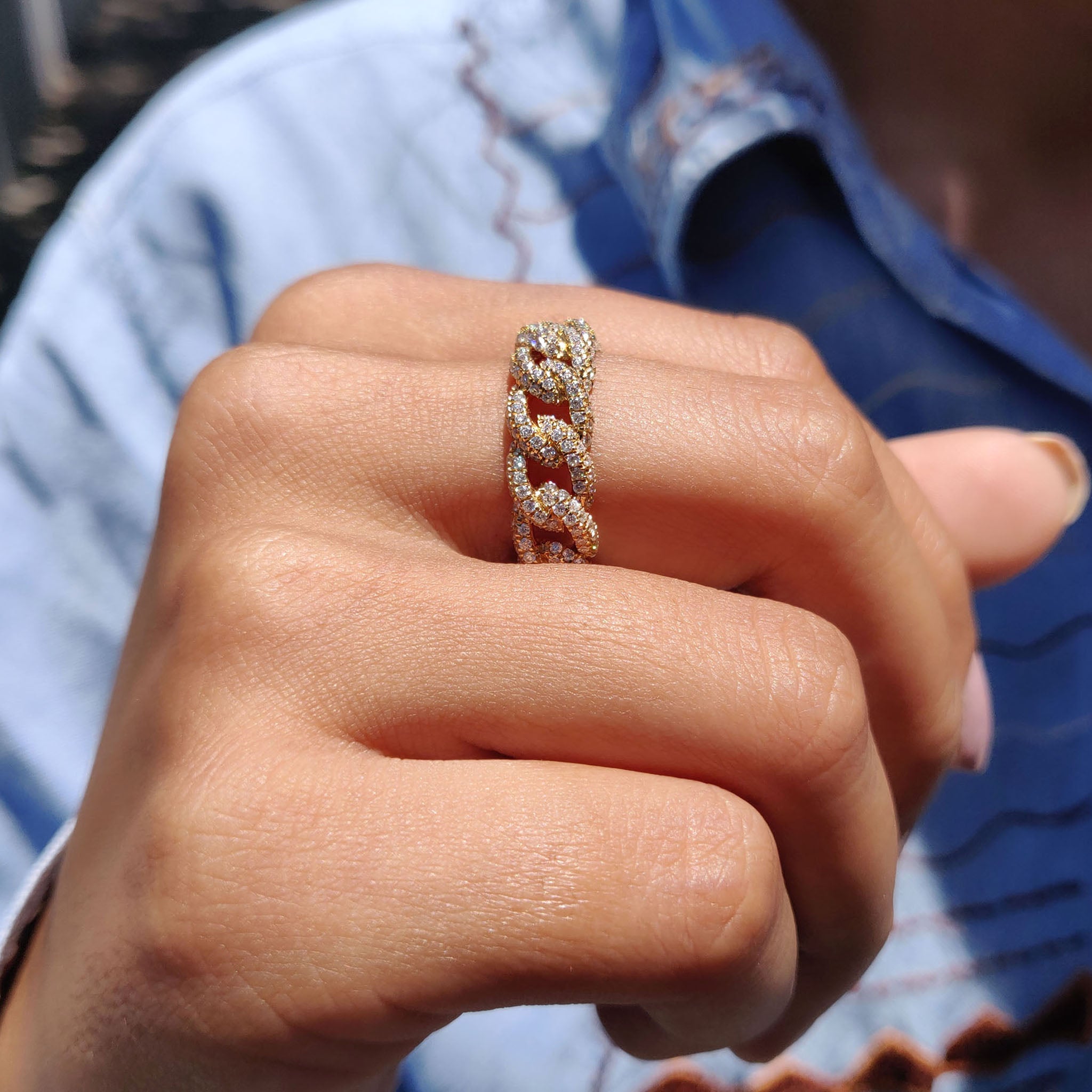 Handmade band featuring round Moissanite stones, set in a classic yellow gold band.