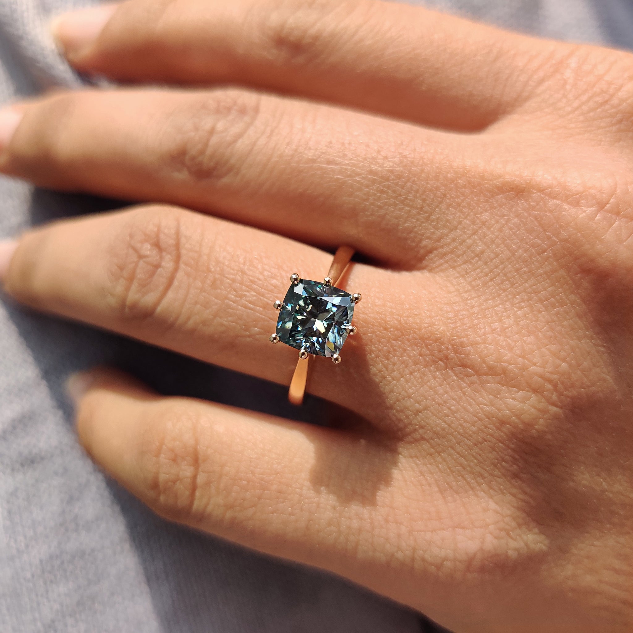 Hidden halo setting wraps secret shine beneath the stone.