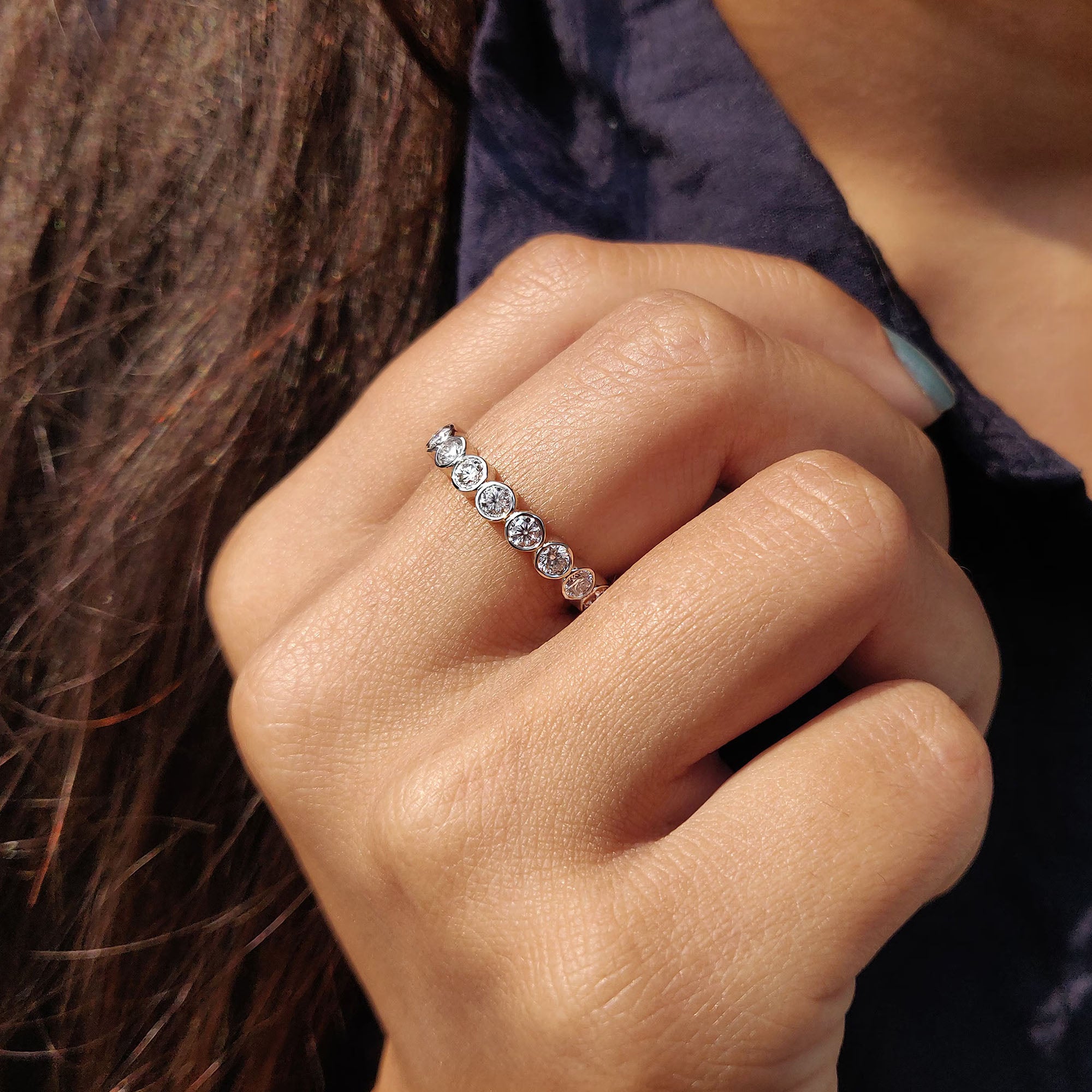 Carat moissanite band with a simple design.
