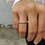 White gold stackable wedding band with moissanite