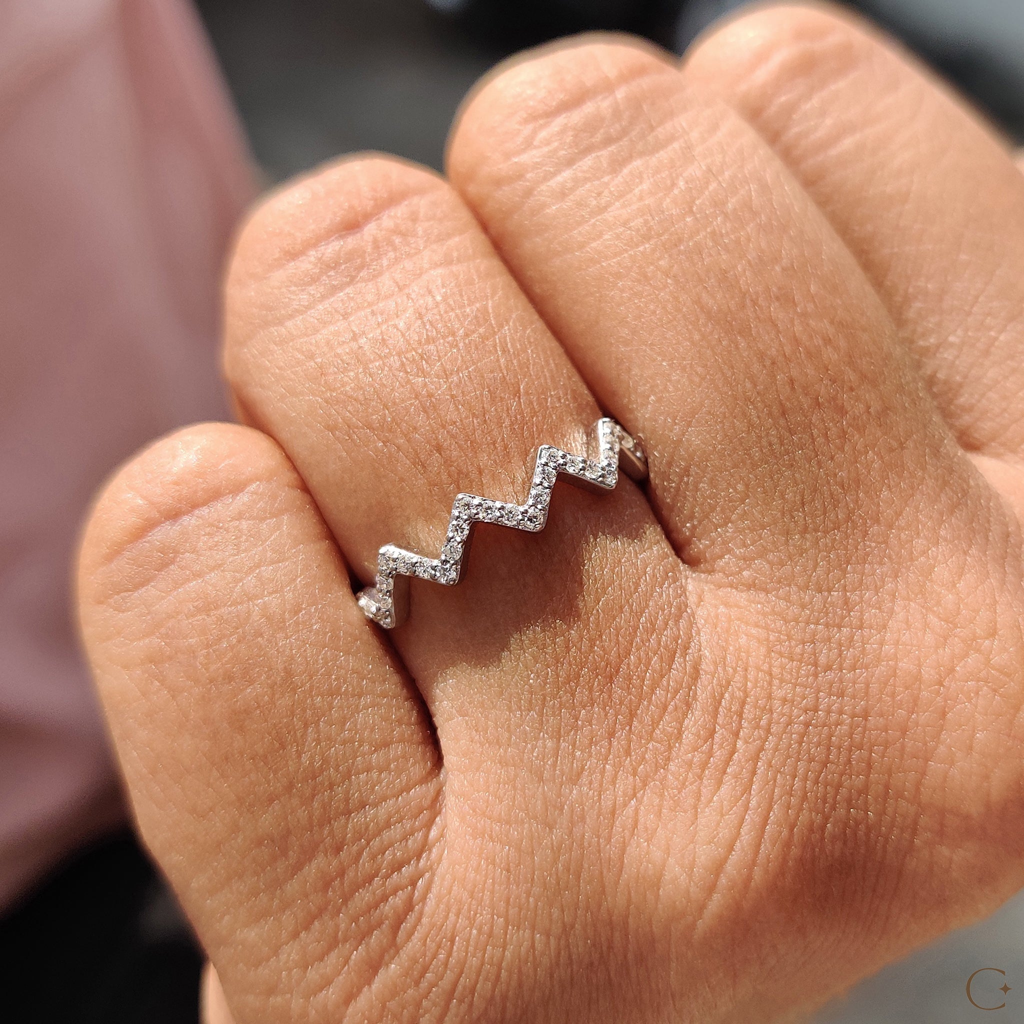 Simple wedding band made with lab grown diamonds.
