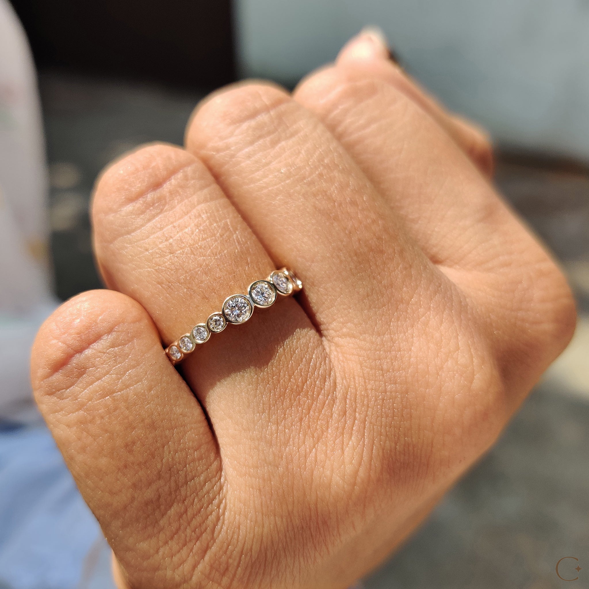 Simple wedding band made with lab grown stones.
