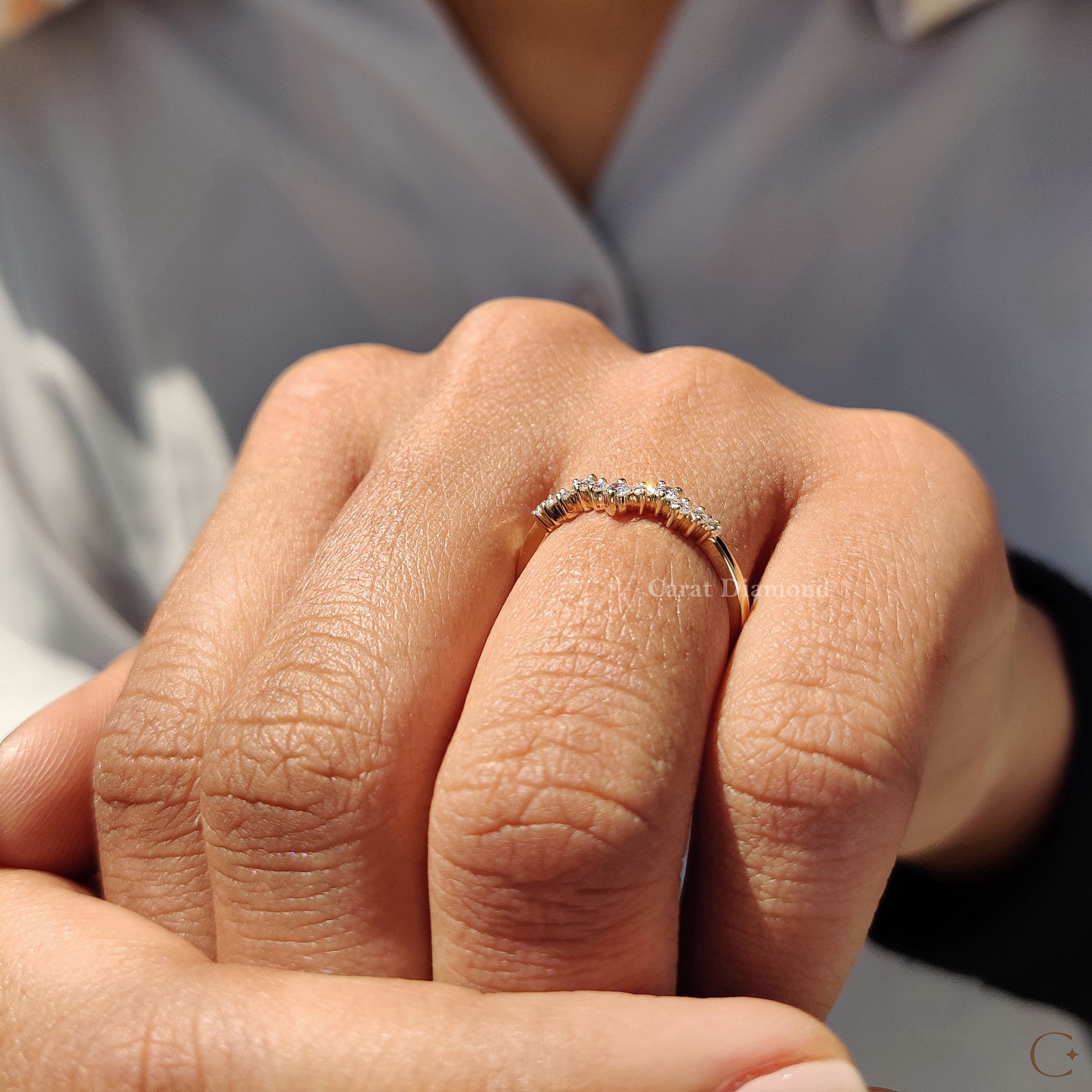 Curvy band styled with a stackable wedding bandfor a layered look.
