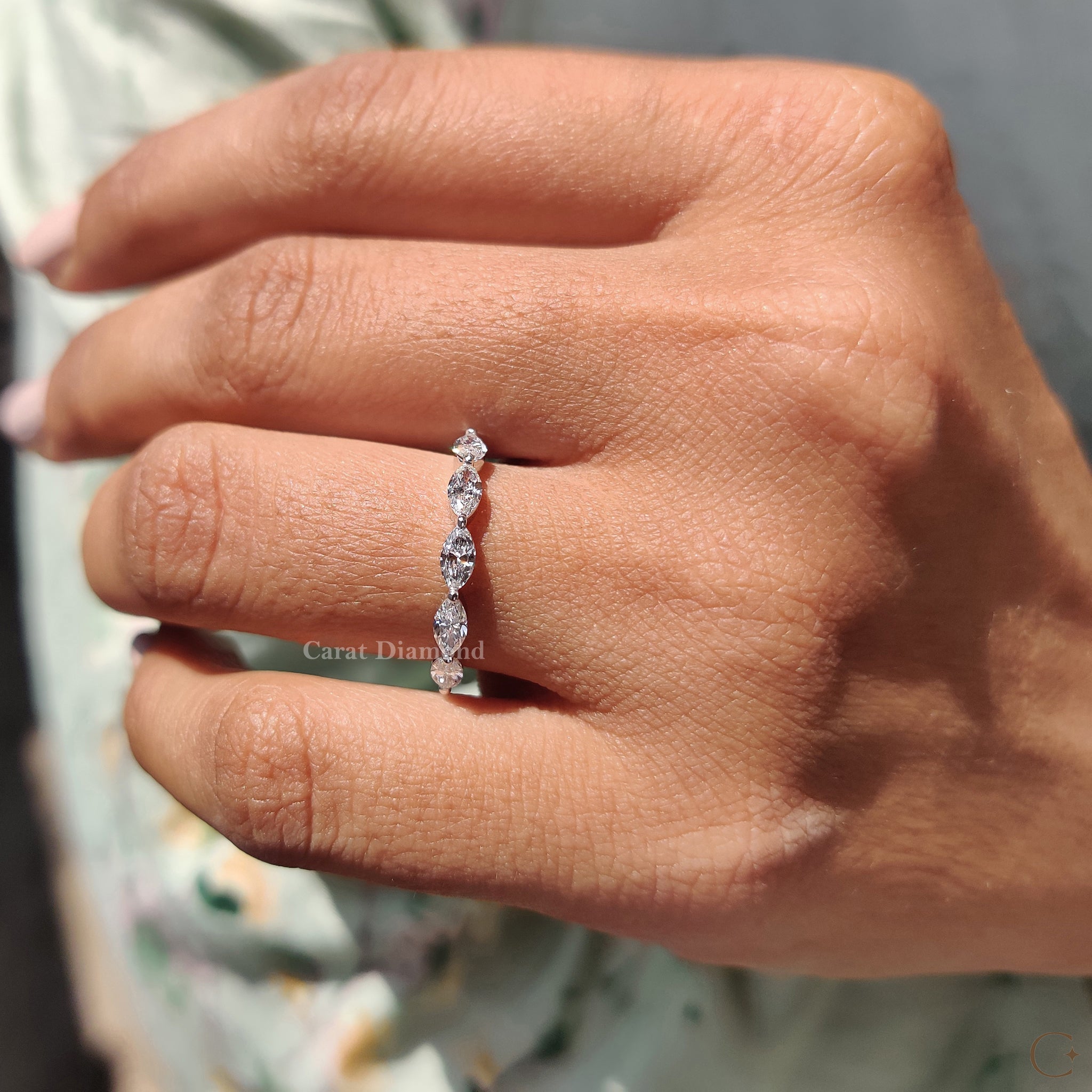 Wedding band for marquise diamond with a classic setting.
