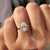 Halo round cut ring set in yellow gold ring.
