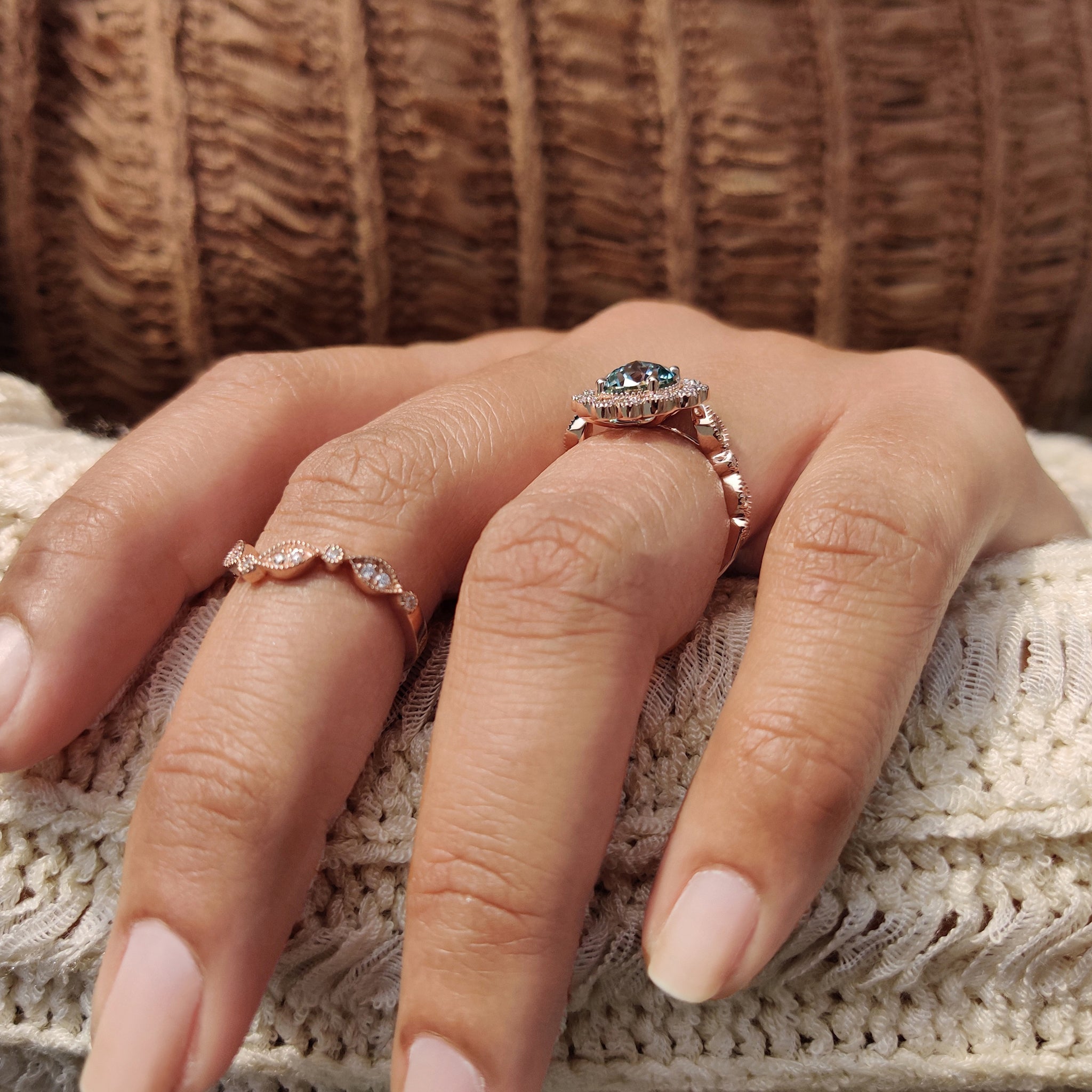 Rose gold bridal set with a jubilee cut moissanite ring and v shaped band.

