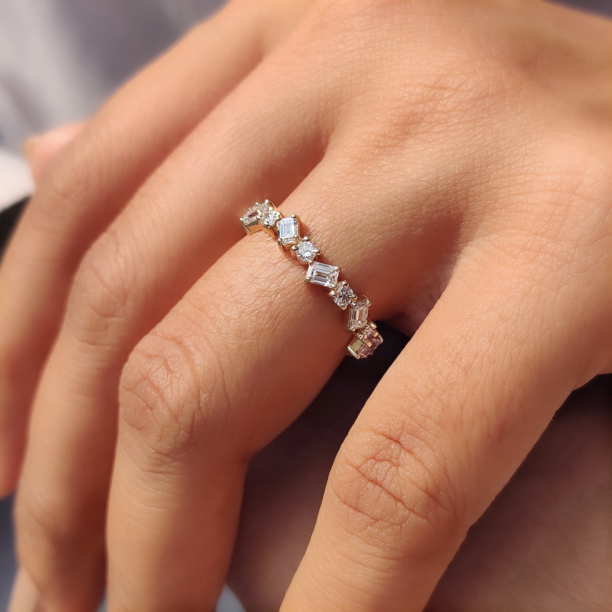 Handmade jewelry with zig zag diamond band design.