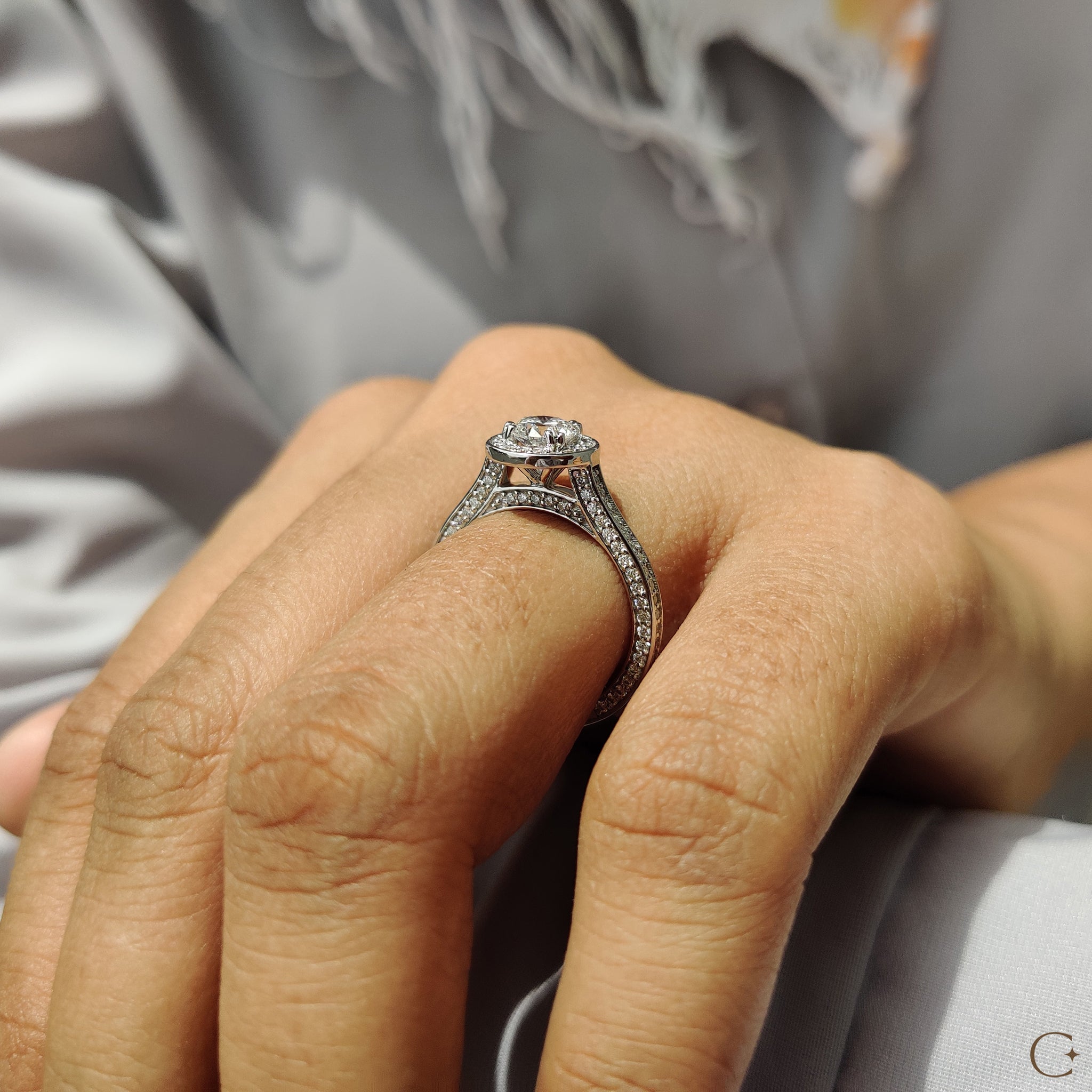 Buy engagement ring with a lab-grown diamond center.
