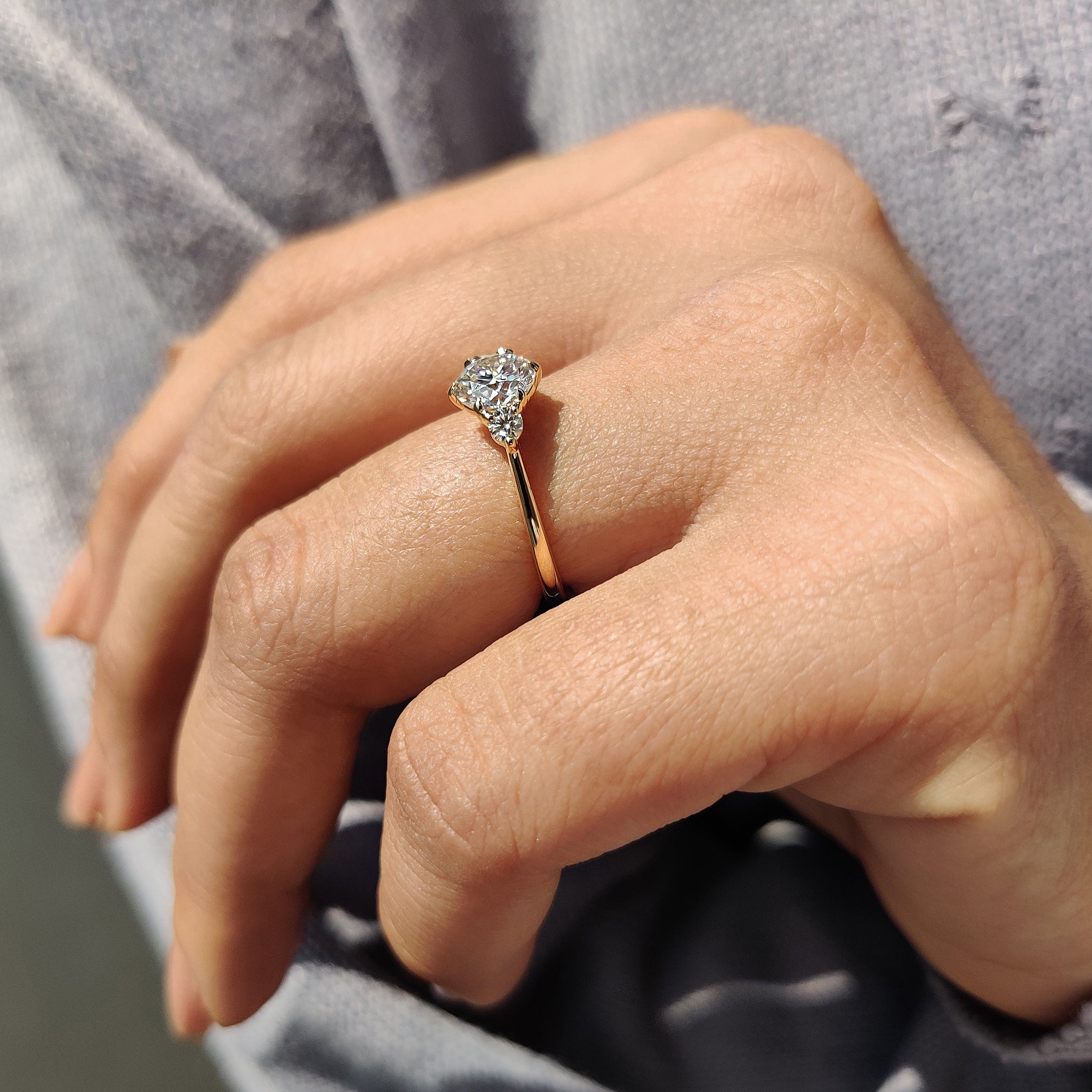 Moissanite engagement ring featuring a stunning cathedral setting for extra elegance.