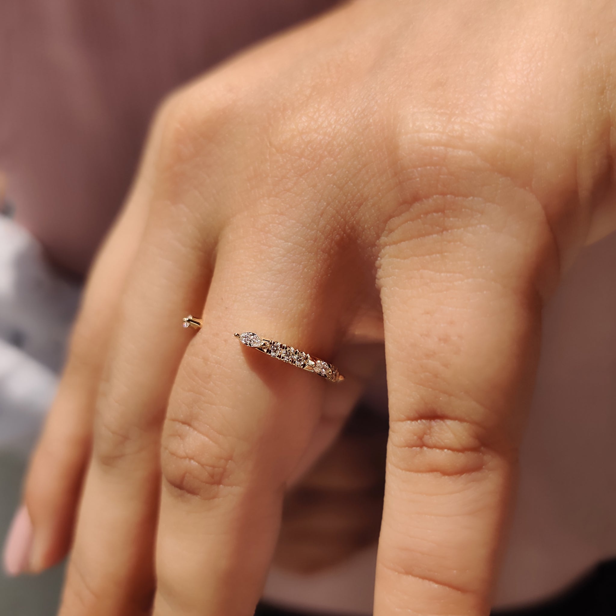 Prong set wedding band showcasing brilliant diamonds.
