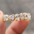 Handmade band featuring a combination of carat diamonds and moissanite stones.