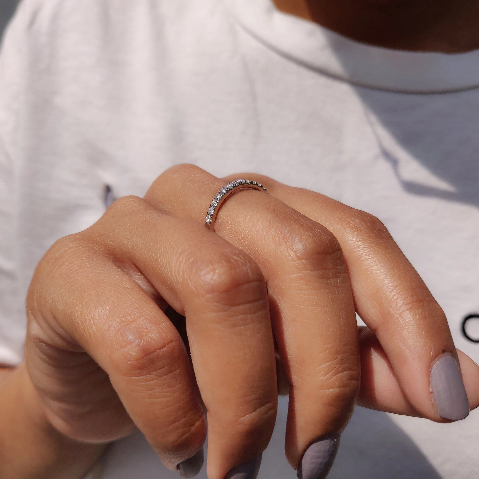 Simple moissanite band suits half eternity wedding band.
