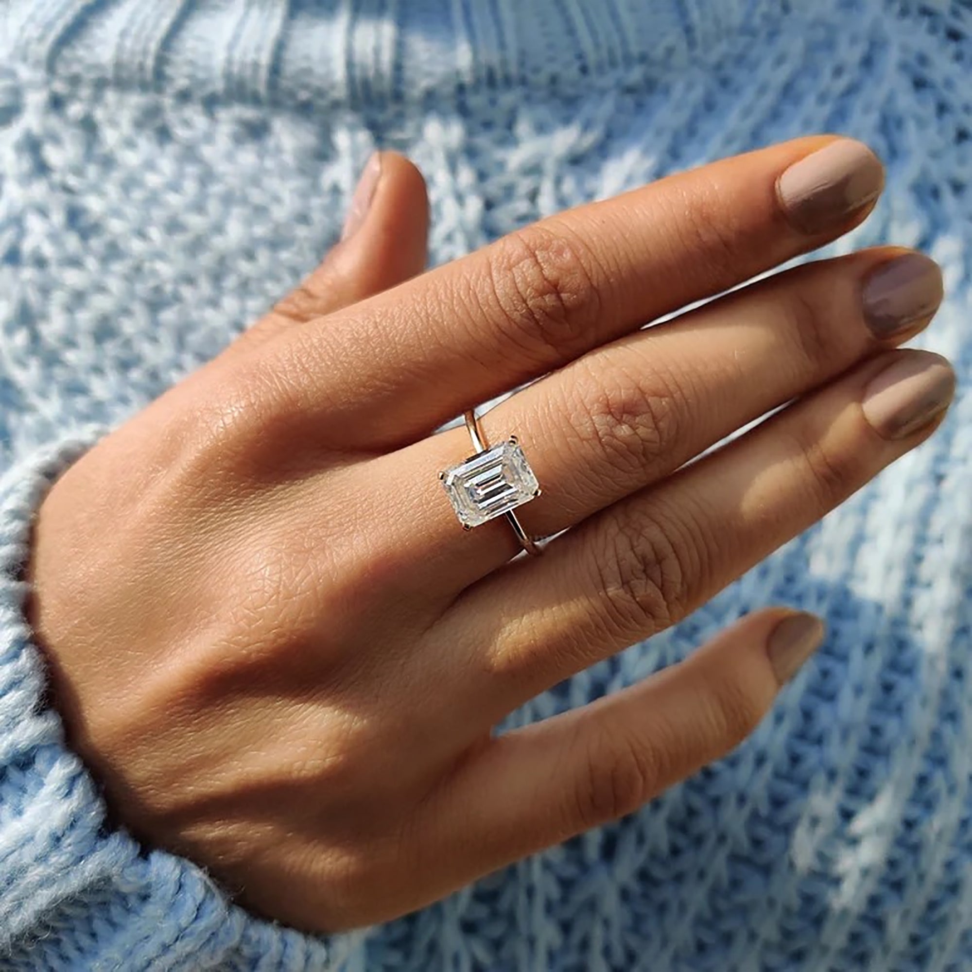 Handmade jewelry with emerald cut moissanite.
