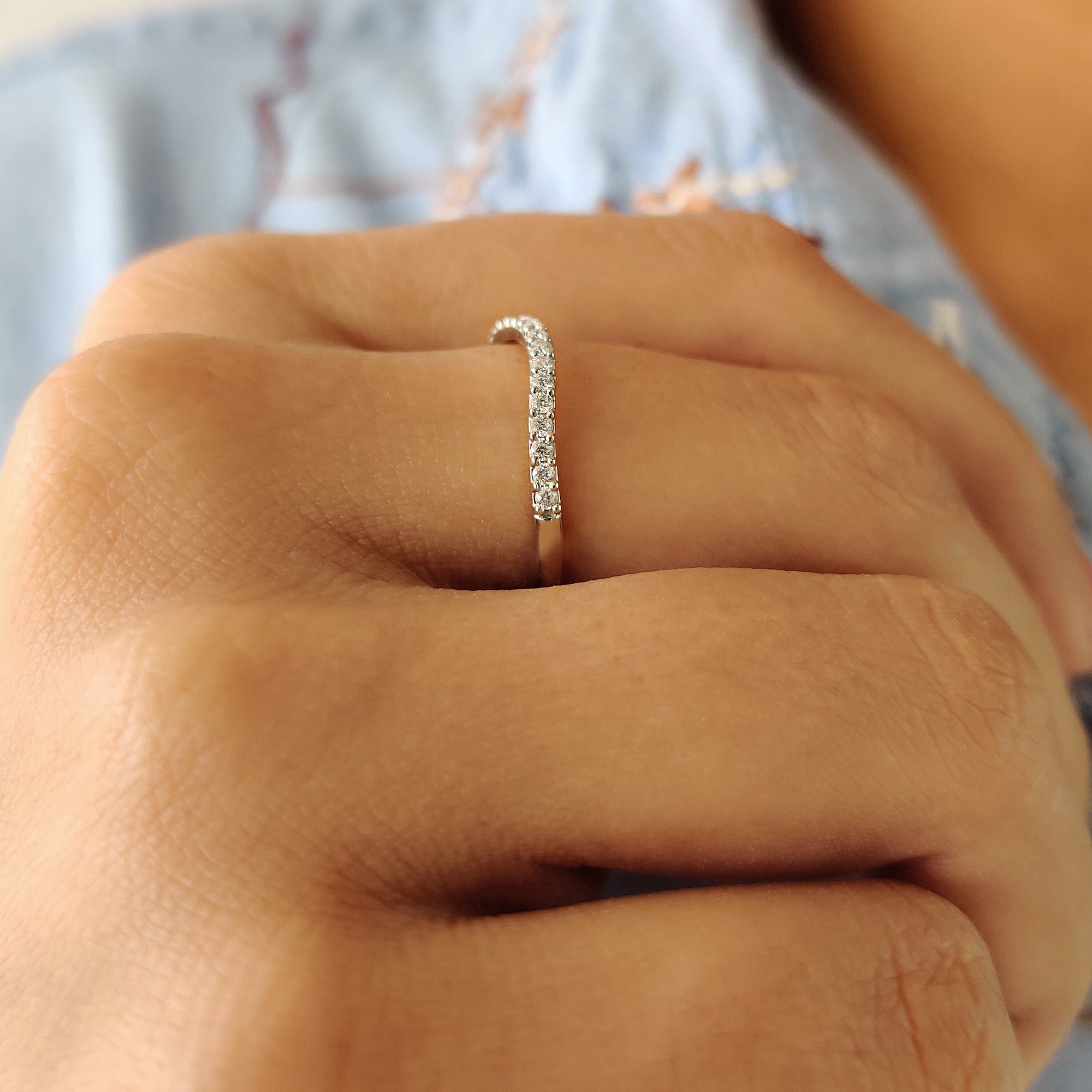 Buy Moissanite Band for an elegant, affordable alternative to diamonds.

