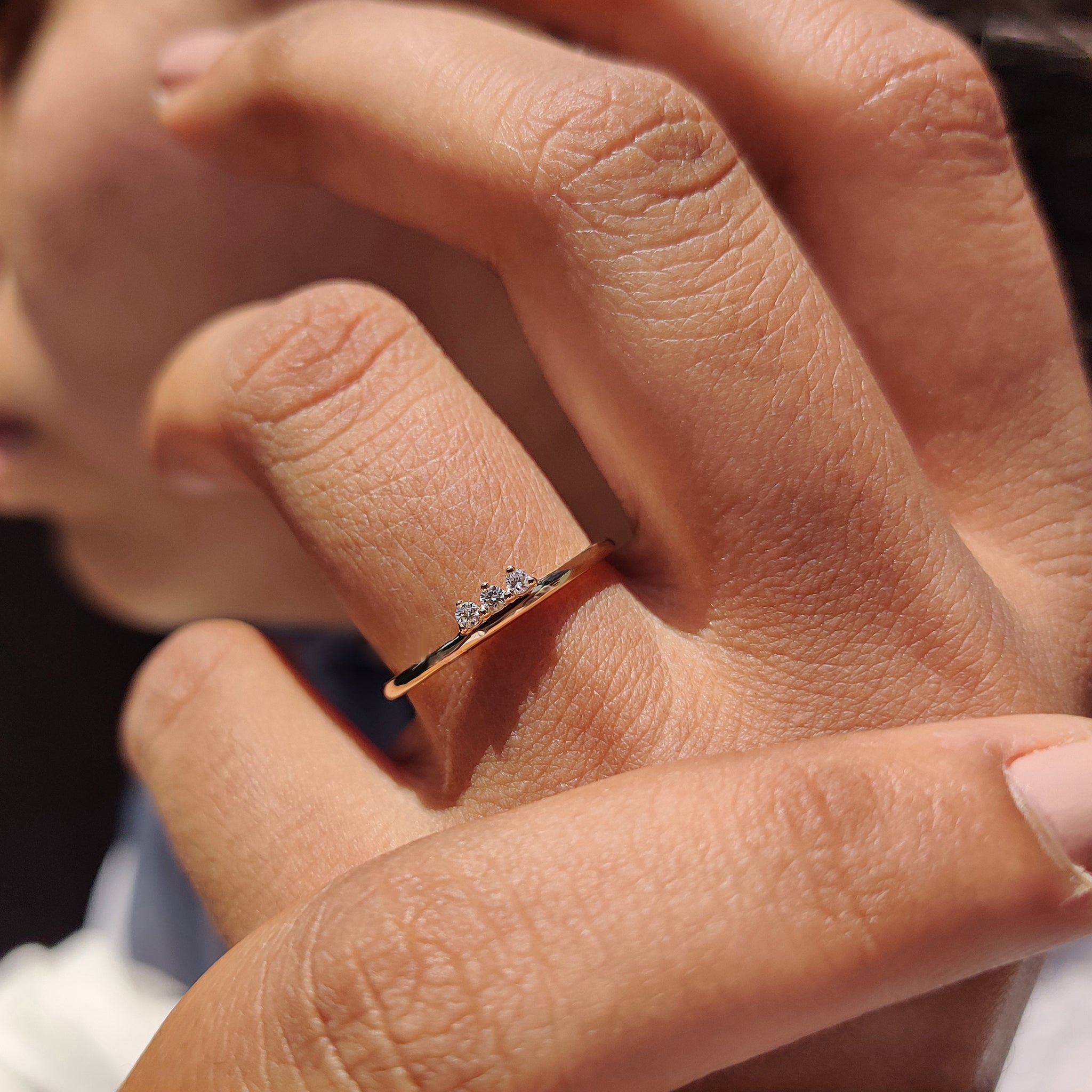 3 stone wedding band with round diamonds.
