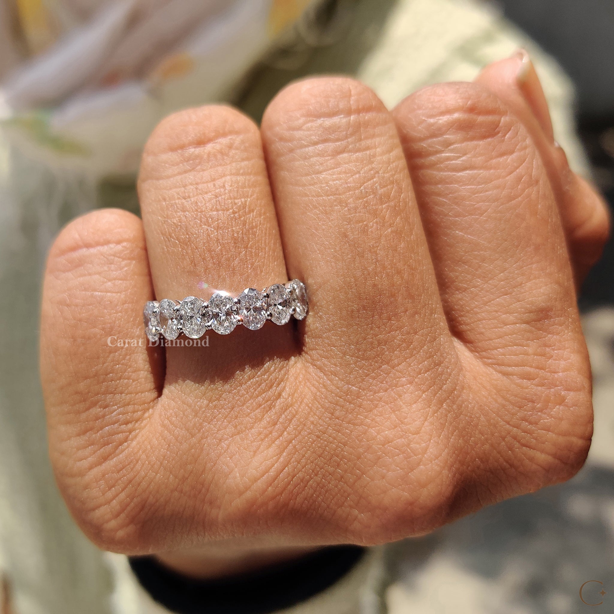 White gold wedding band with a sleek, polished finish.
