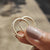 Matching wedding band set in yellow gold with delicate moissanite accents.