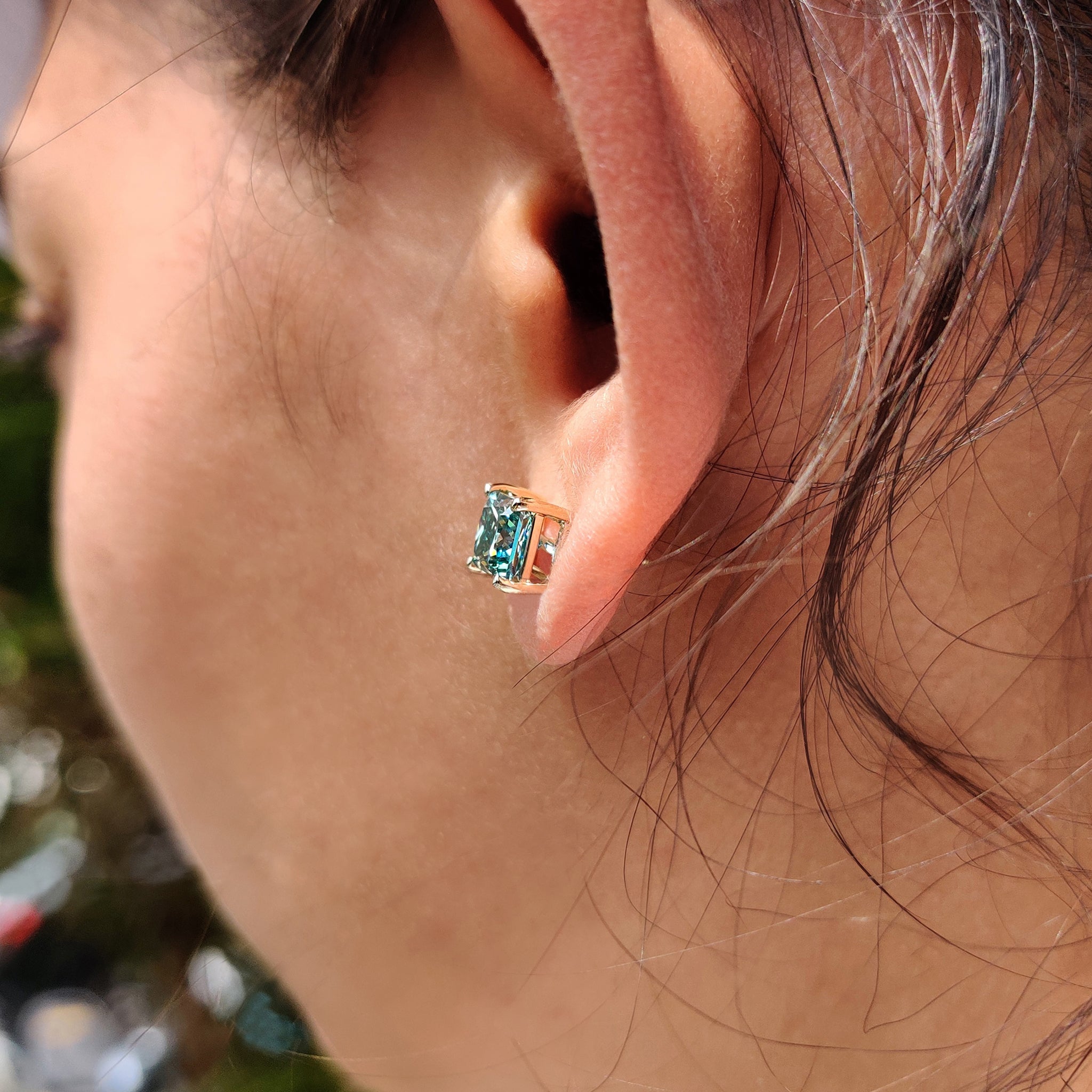 Screw back earrings included in Cyan Blue Princess Cut Moissanite earrings for added comfort.
