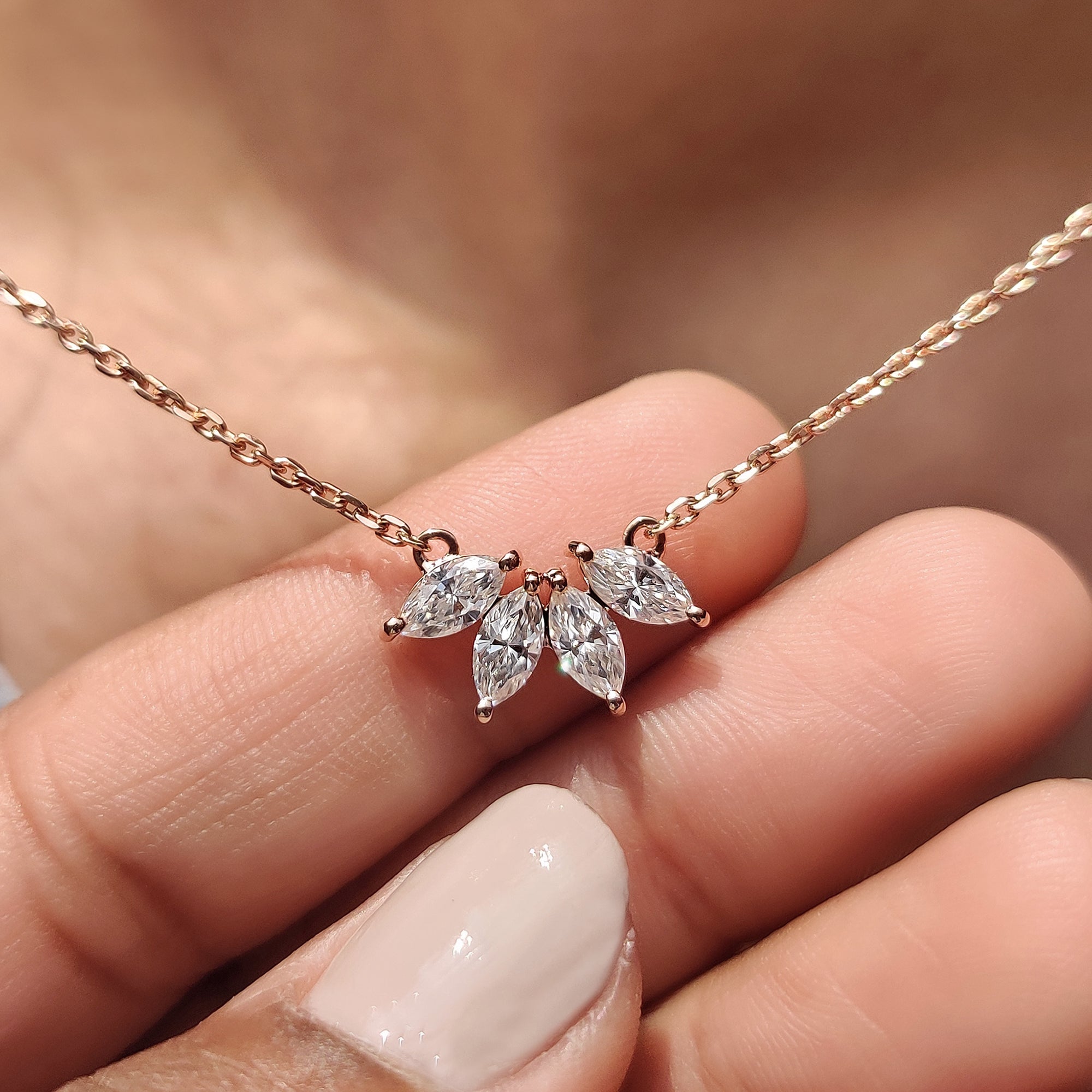 Marquise Cut Moissanite Pendant styled with prong set pendant and custom moissanite pendant.
