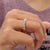 Round wedding band styled for a classic, smooth look.