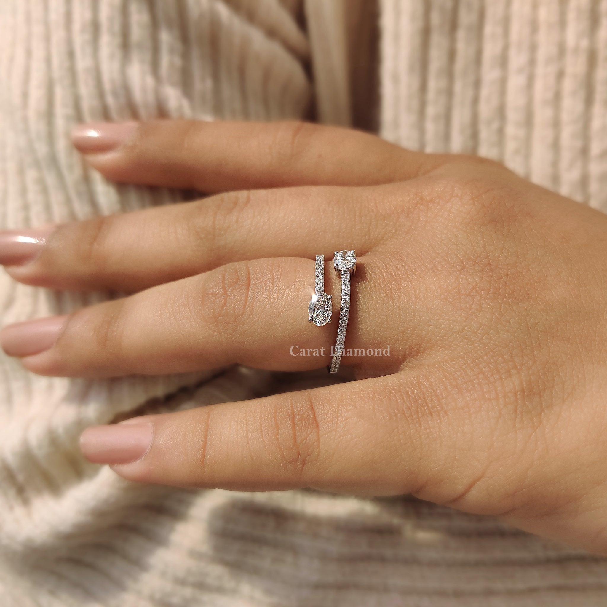 Pave band engagement ring adds soft detail along the edges.
