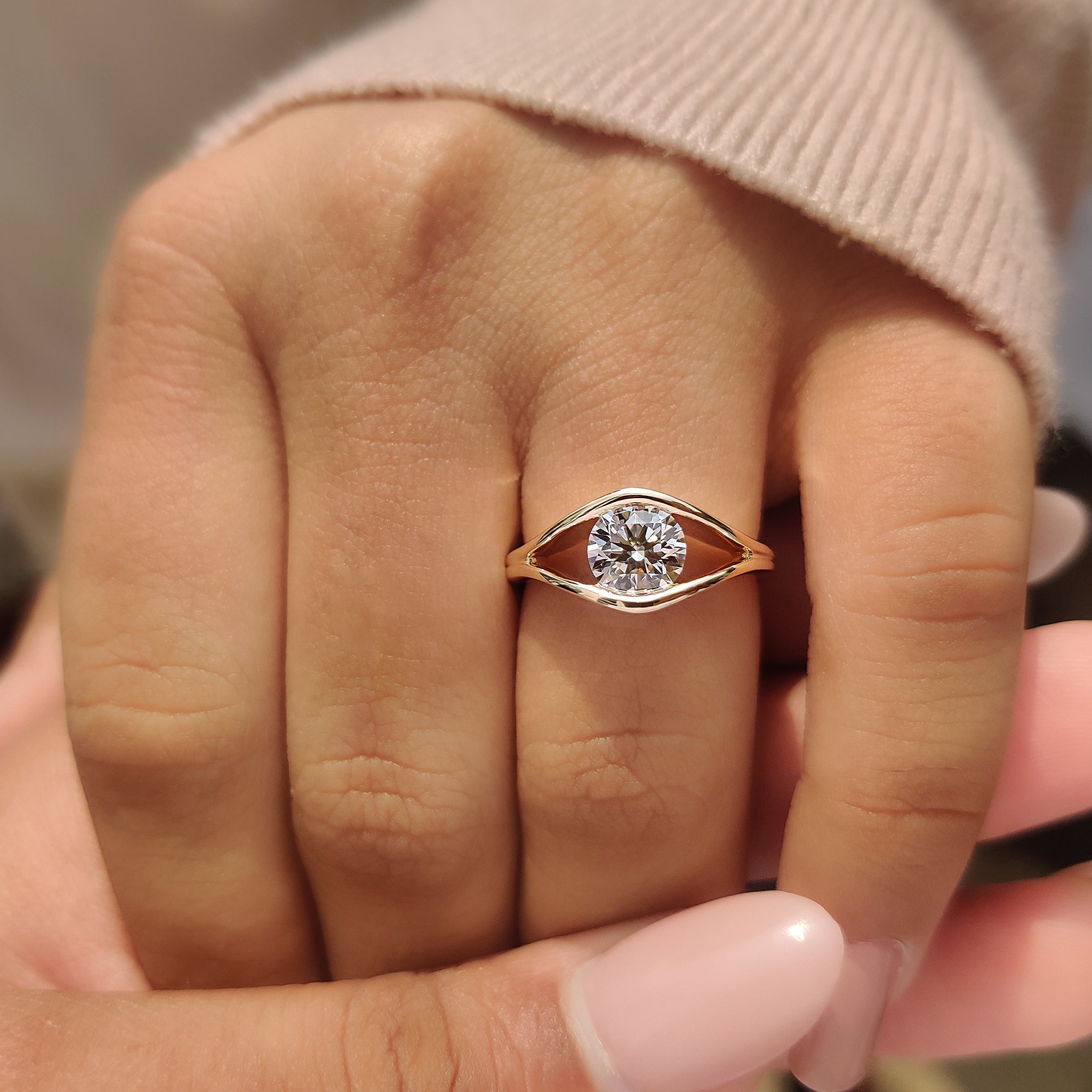 A Carat Diamonds ring with a split shank design
