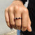 Baguette and round wedding band with mixed stone design.