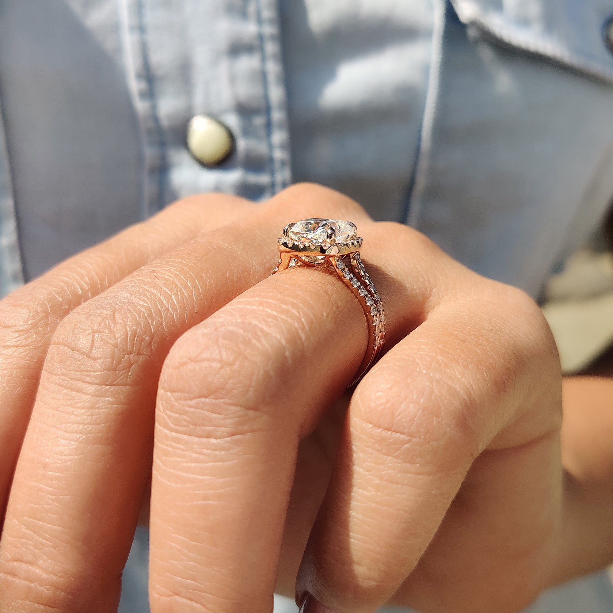 Round cut split pave set band paired with a moissanite engagement ring—ideal for someone searching for the best place to buy an engagement ring.
