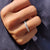 Handmade band with Moissanite stones, ideal for couples looking for custom wedding bands.