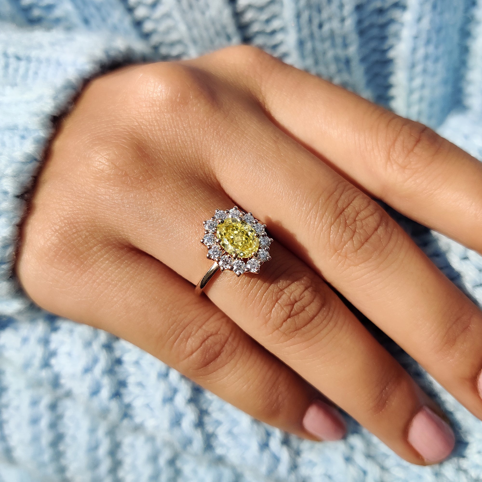 Cluster halo engagement ring creating a stunning sparkle effect.
