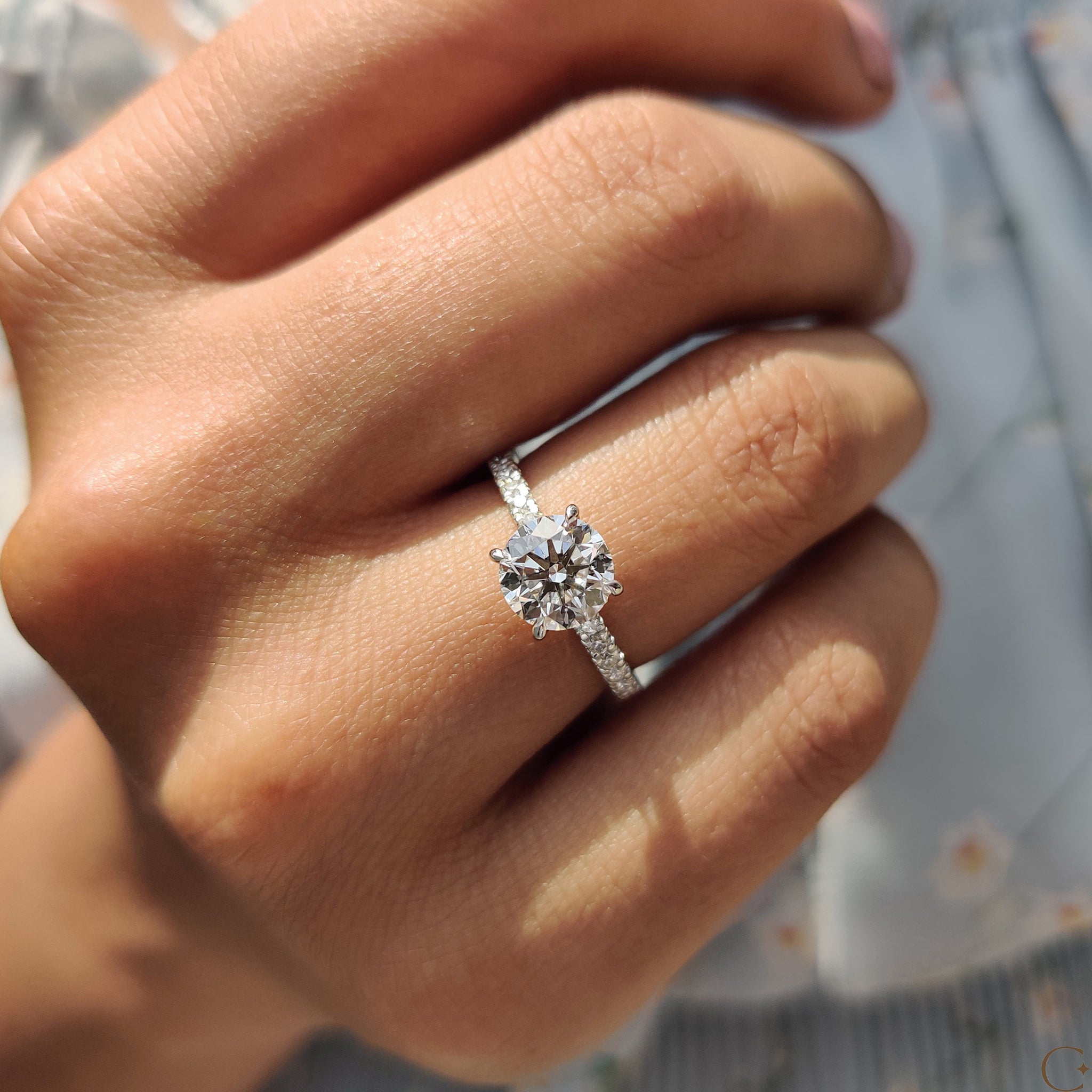 Carat Diamonds ring showcasing a brilliant round cut diamond.