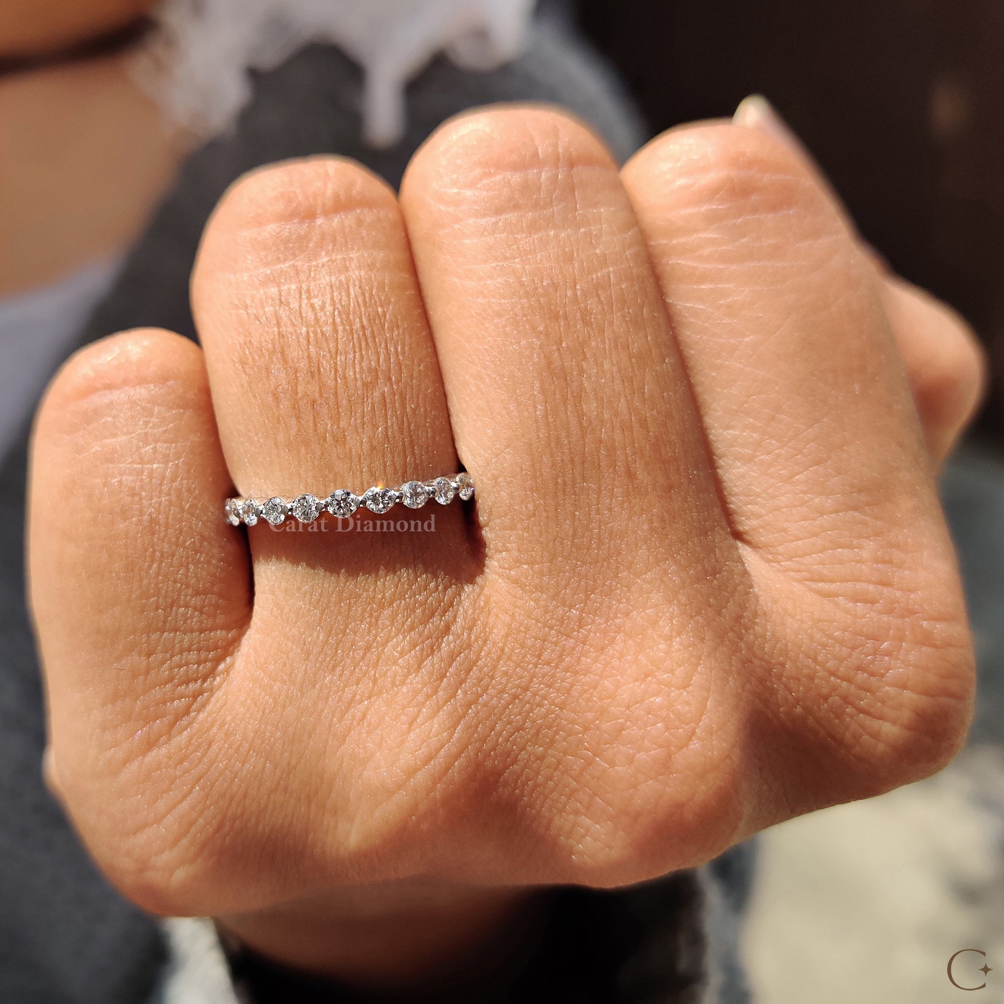 Shared prong wedding band with brilliant lab-grown diamonds.
