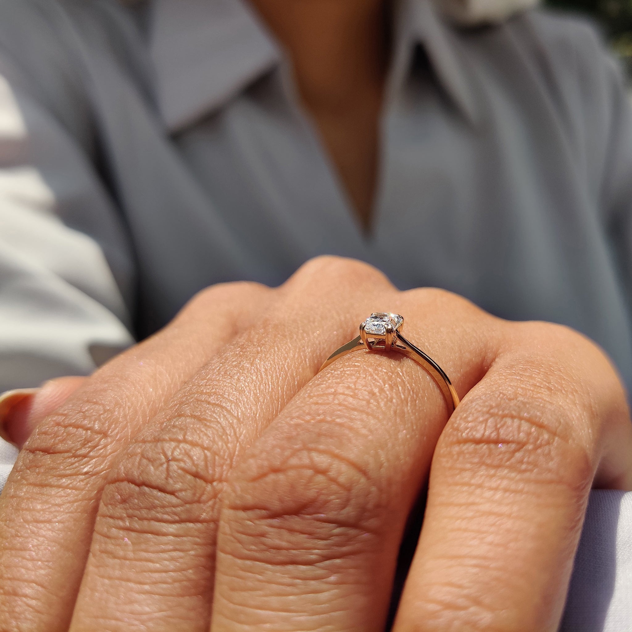 Double claw prong setting showcasing a radiant cut diamond.
