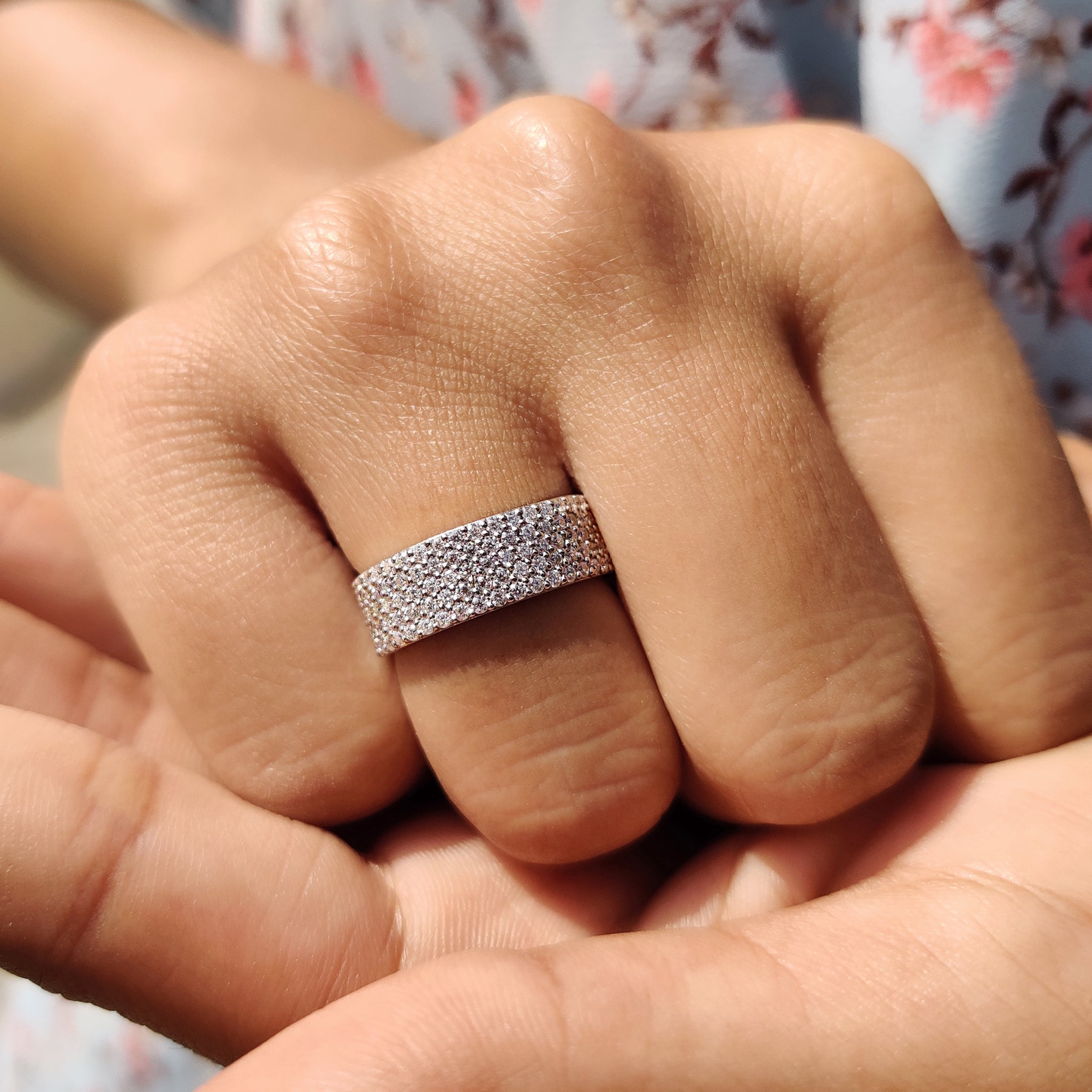 Round cut wedding band with sparkling moissanite, perfect for stacking or daily wear.
