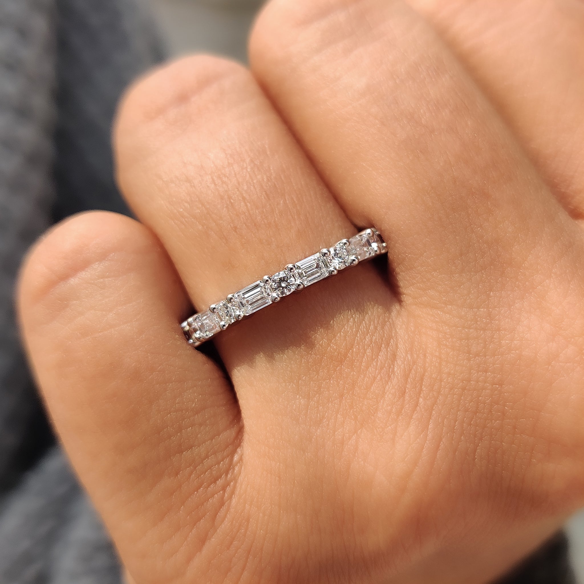 Emerald and round diamond wedding band in a unique mix.