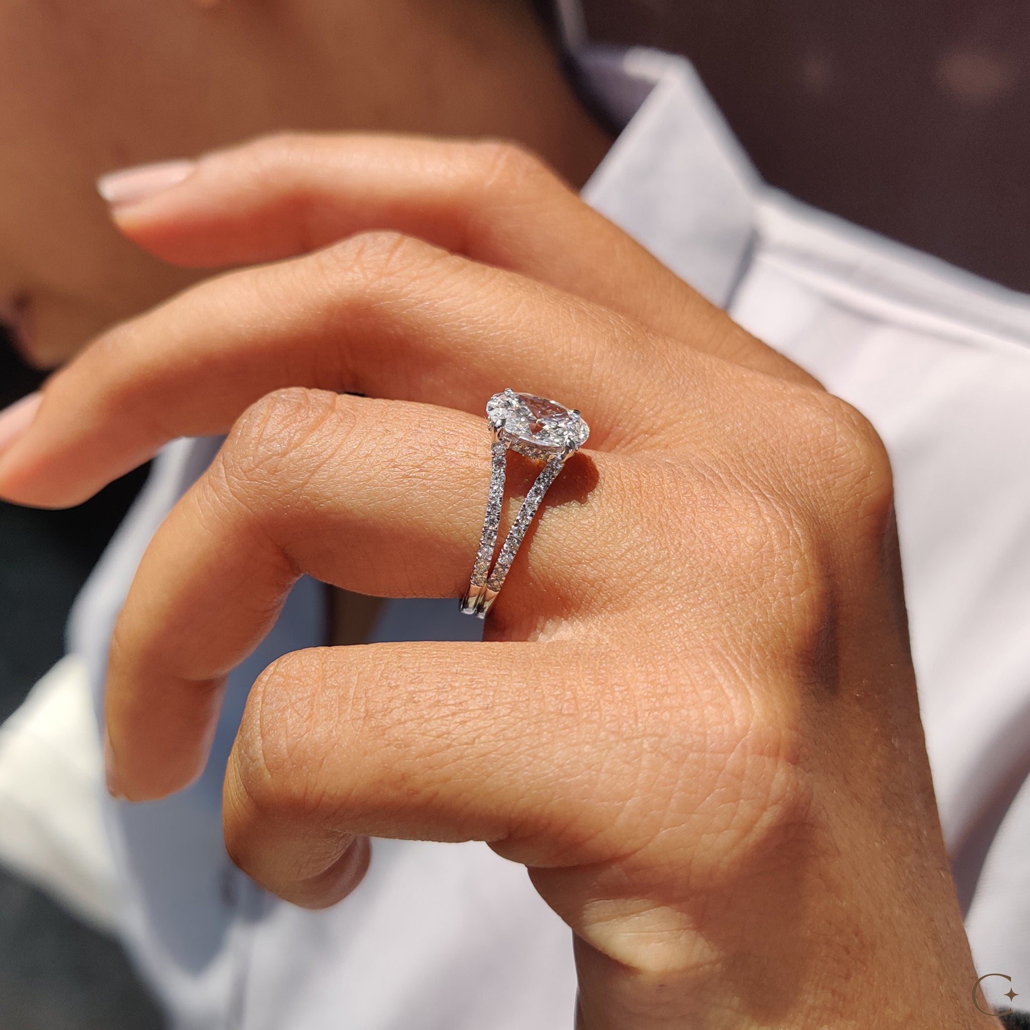 Open gallery ring with unique diamond settings.
